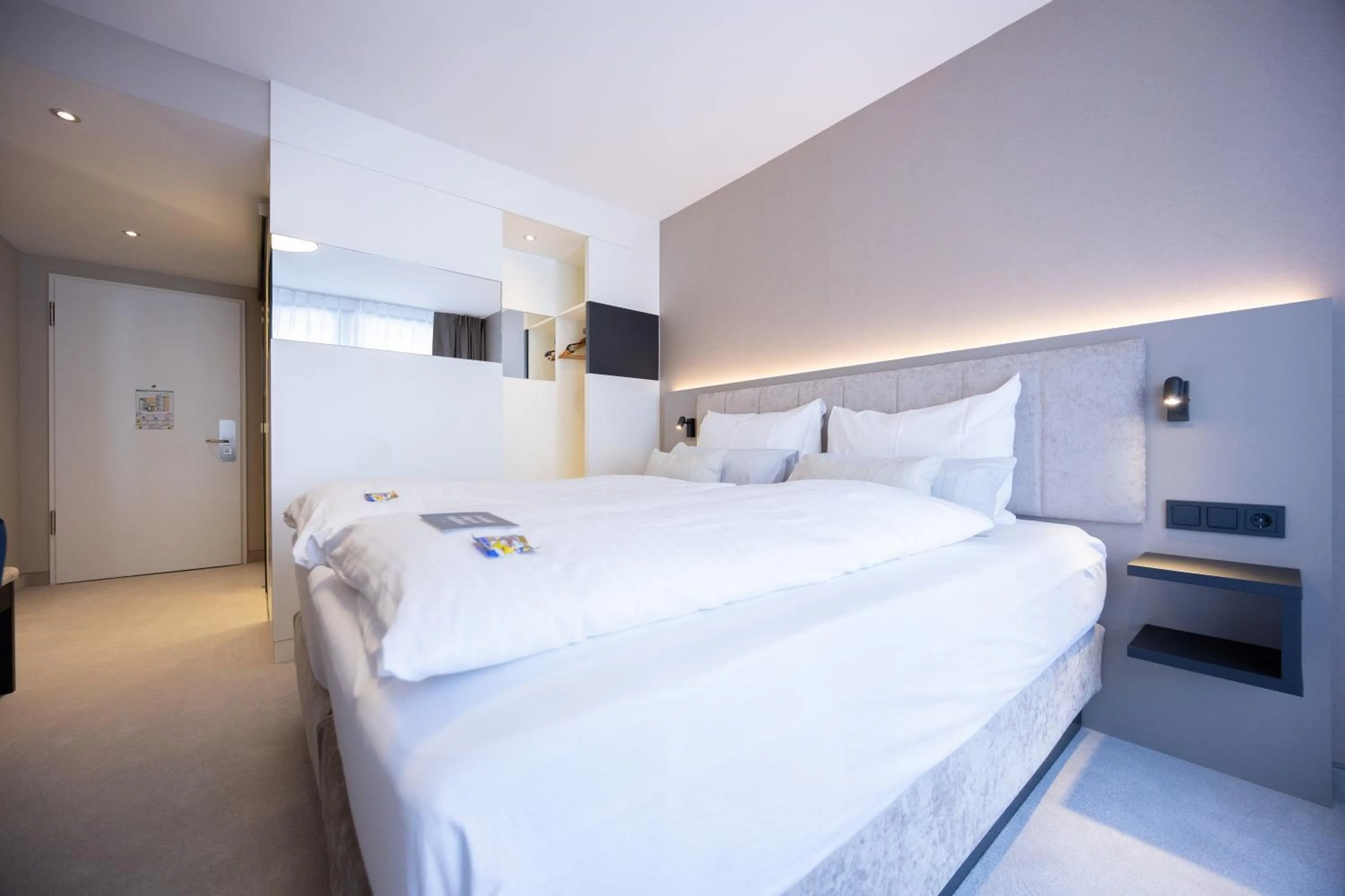 Bed in Digital Hotel Kronjuwel by BRIGHT Waldkirch - Self Check-in