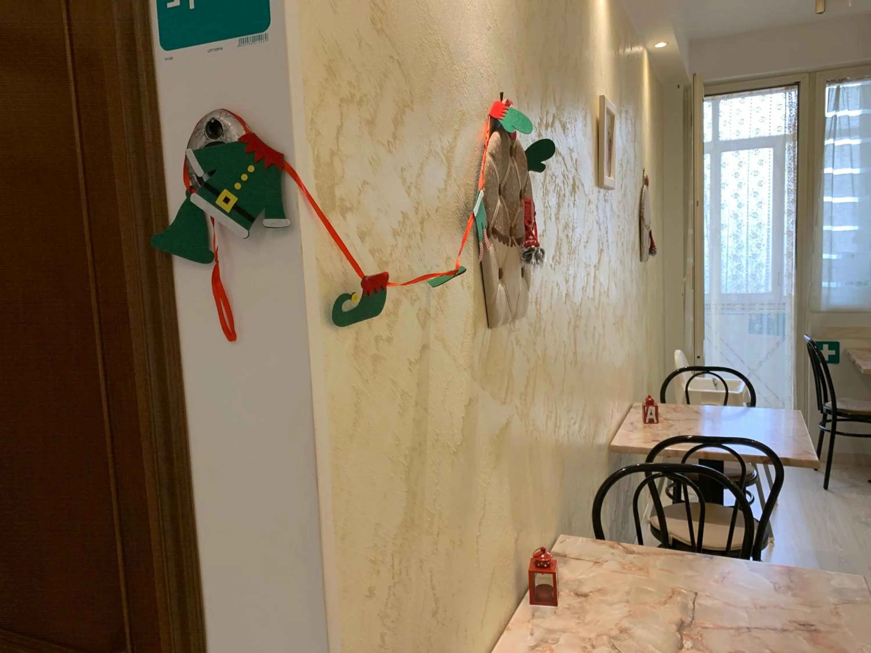 Dining area in B&B La Perla di Roma