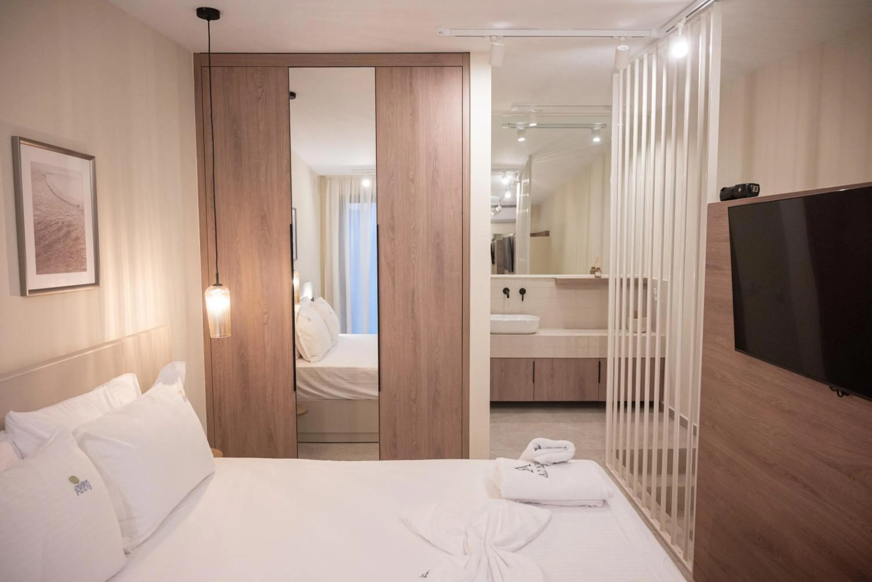 Bed in Anny's Residences & Suites