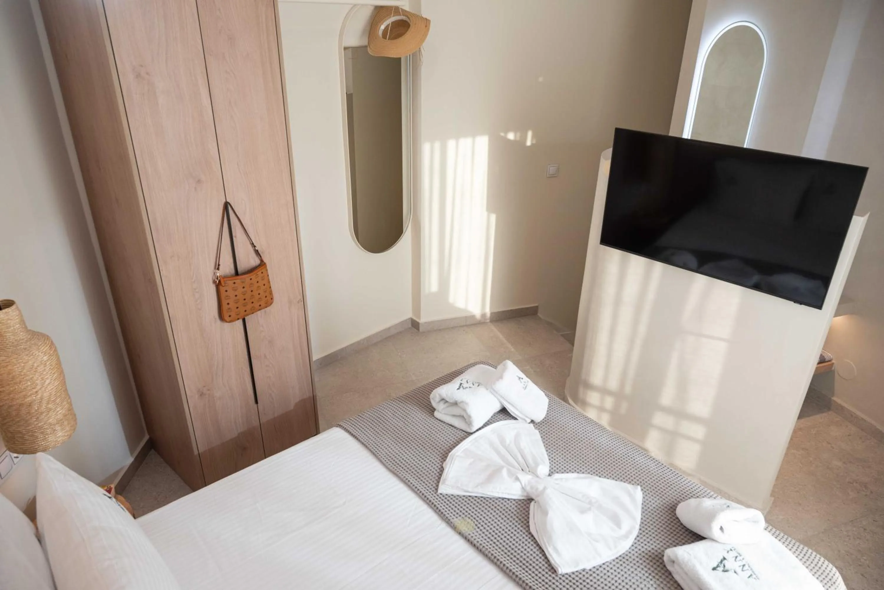 Bed in Anny's Residences & Suites