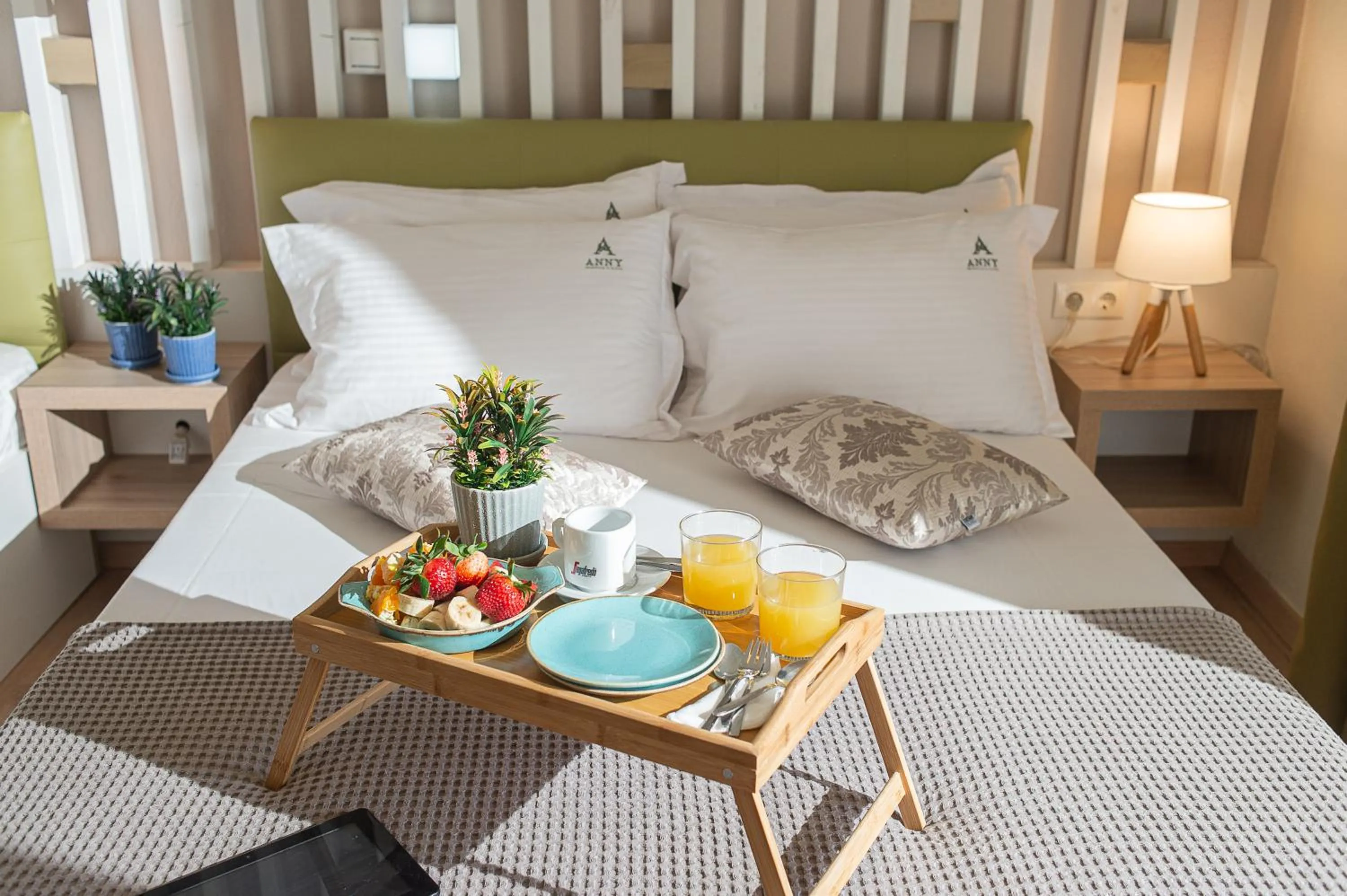 Bed in Anny's Residences & Suites