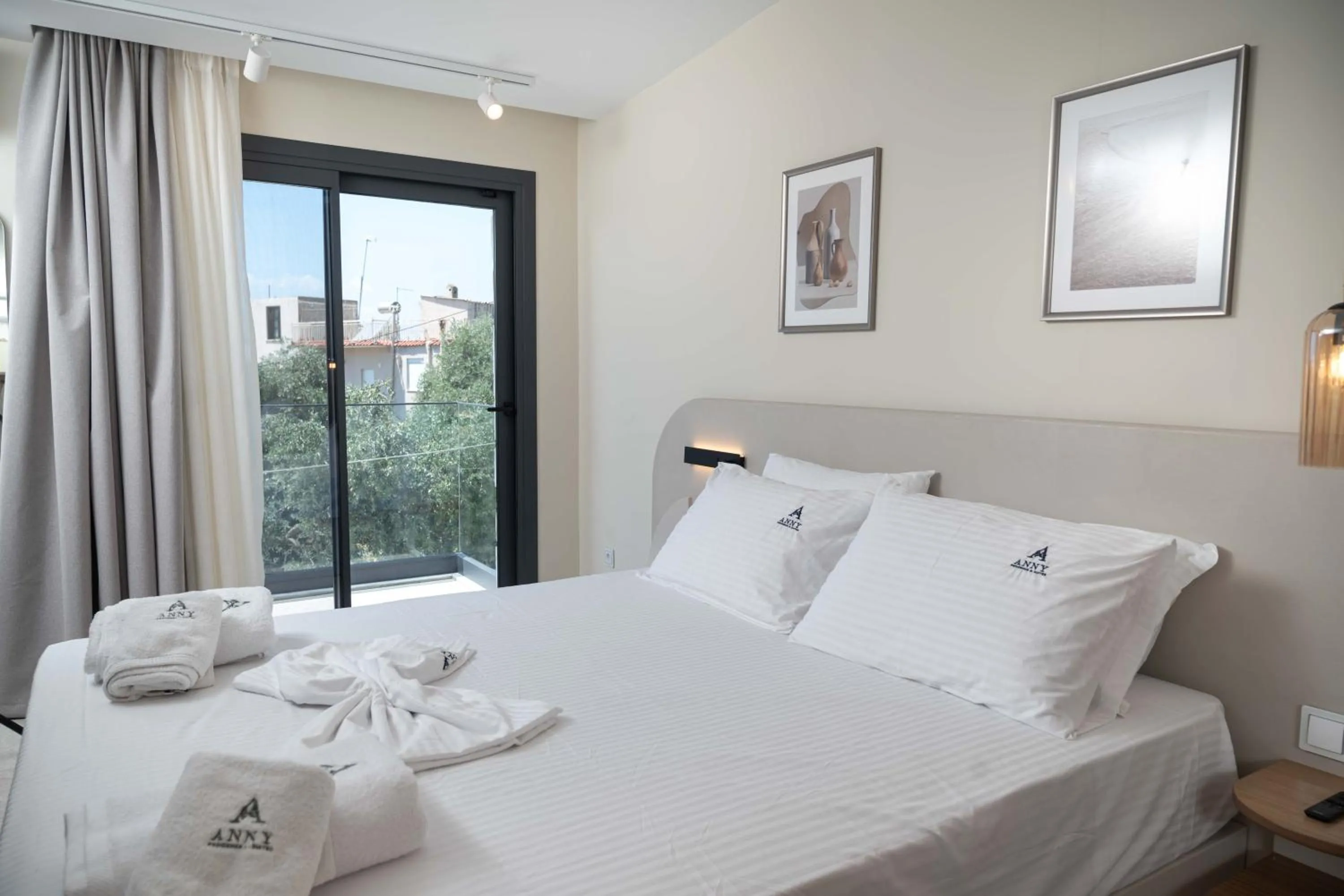 Bed in Anny's Residences & Suites