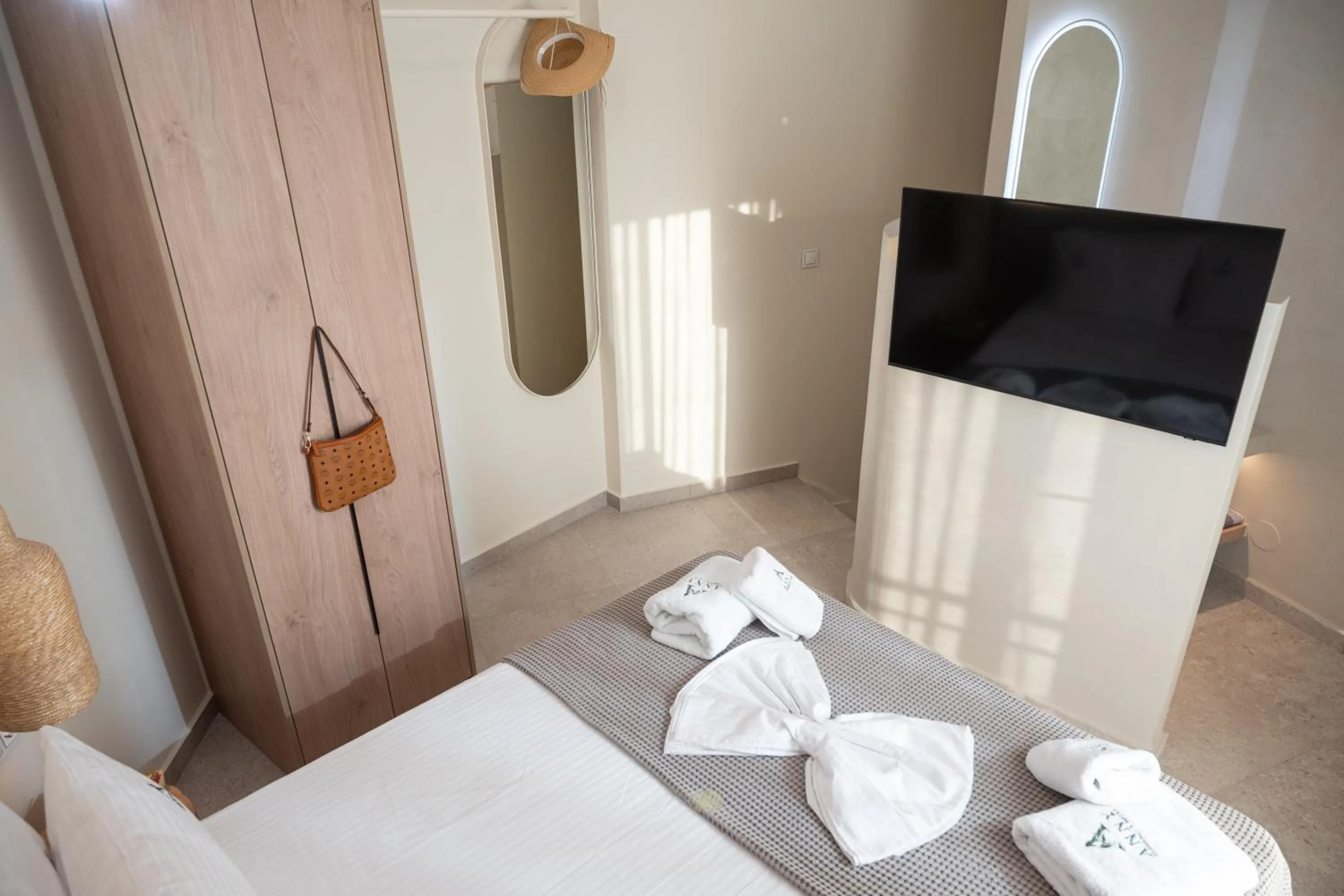 Bed in Anny's Residences & Suites