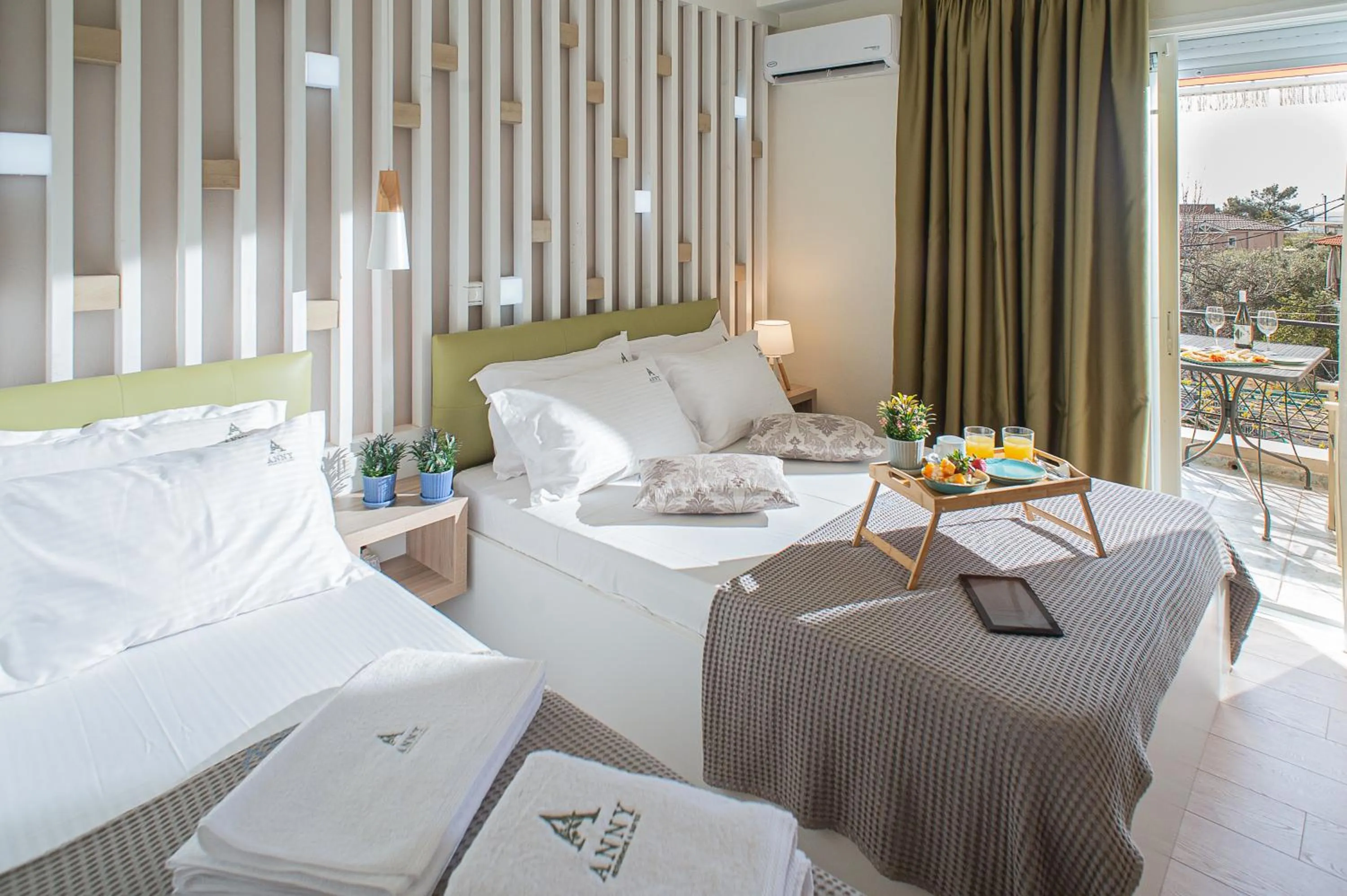 Bed in Anny's Residences & Suites