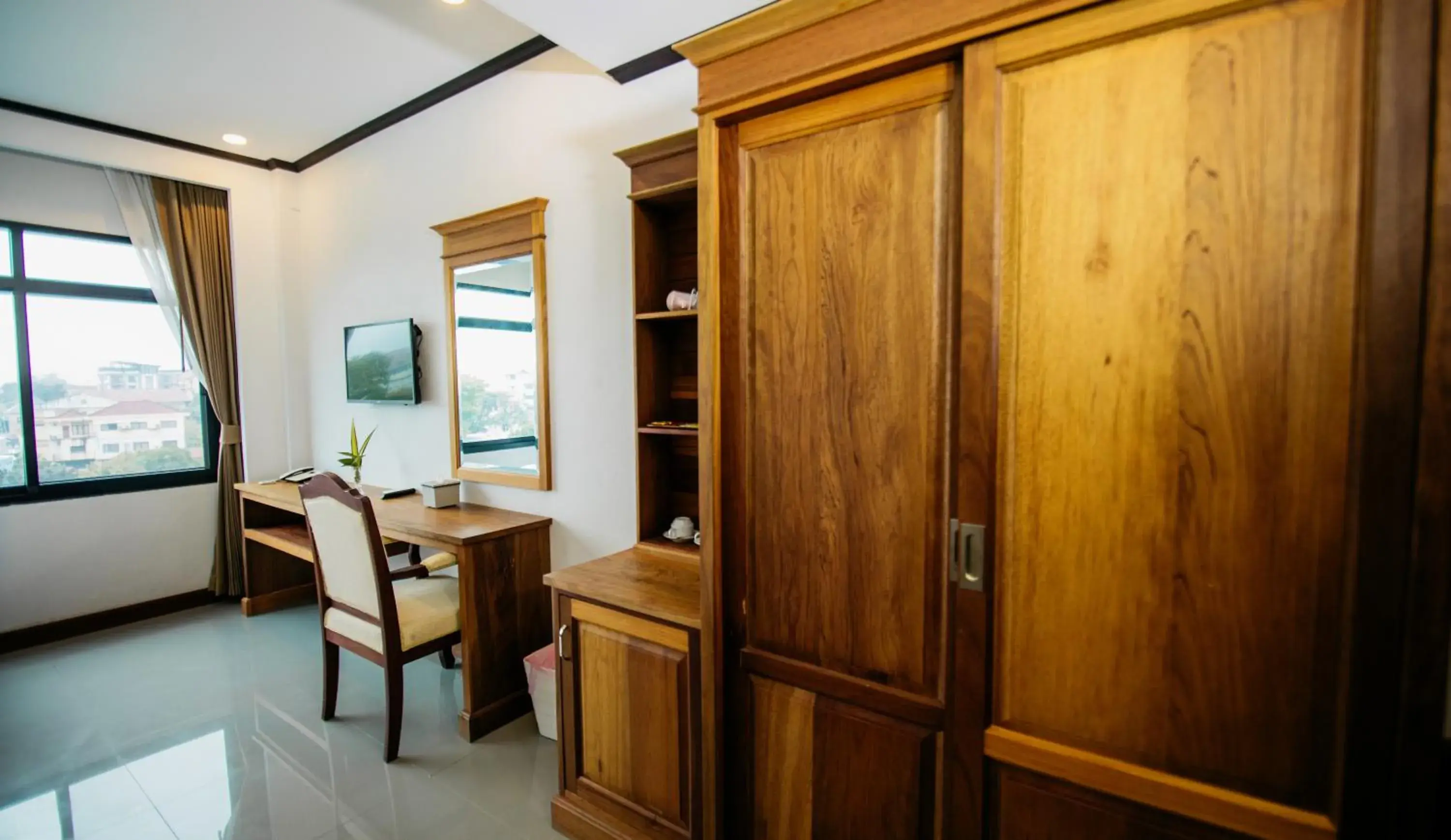 Deluxe Twin Room in Sisombat Plaza Hotel Deluxe Twin Room in Sisombat Plaza Hotel