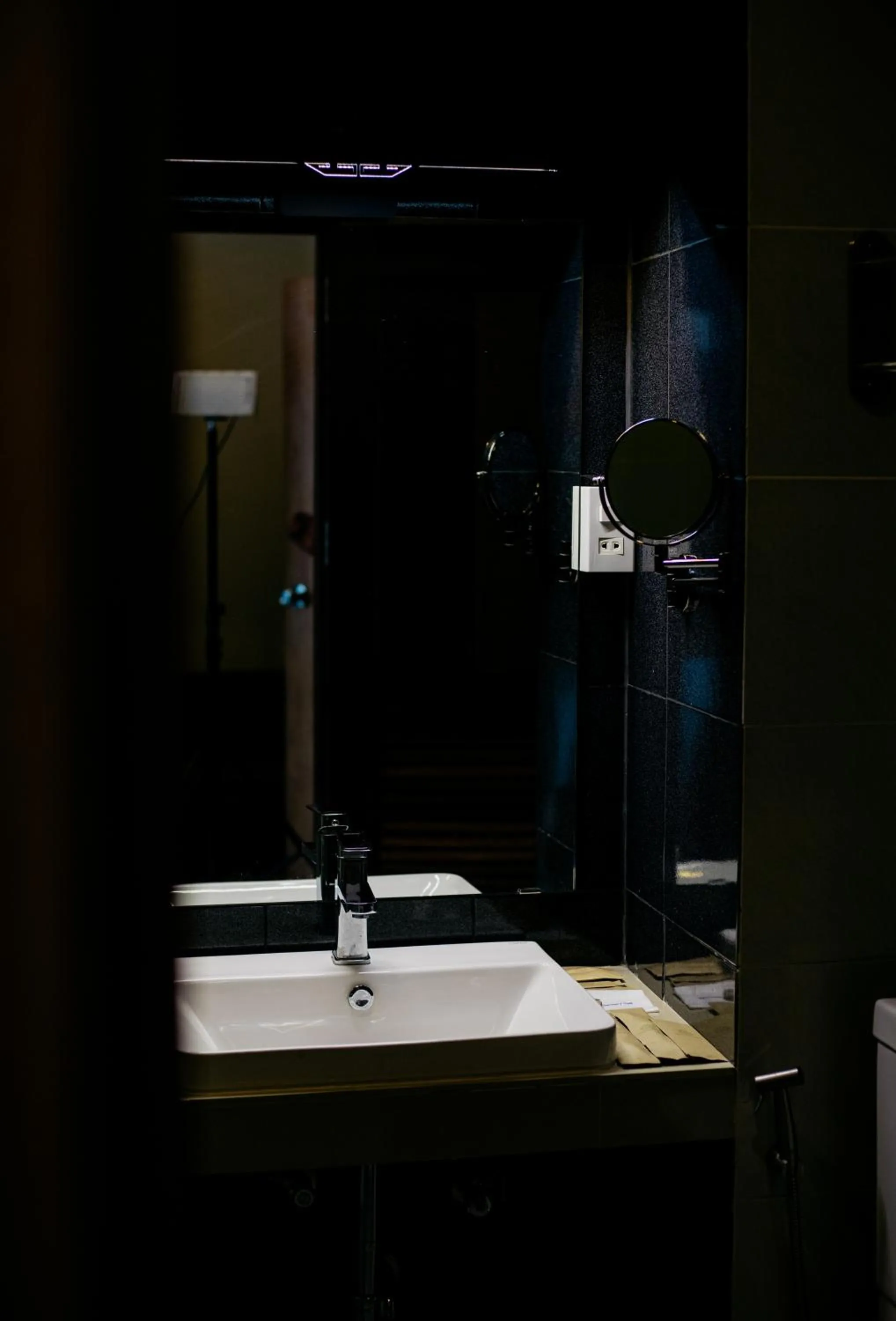 Bathroom in Sisombat Plaza Hotel