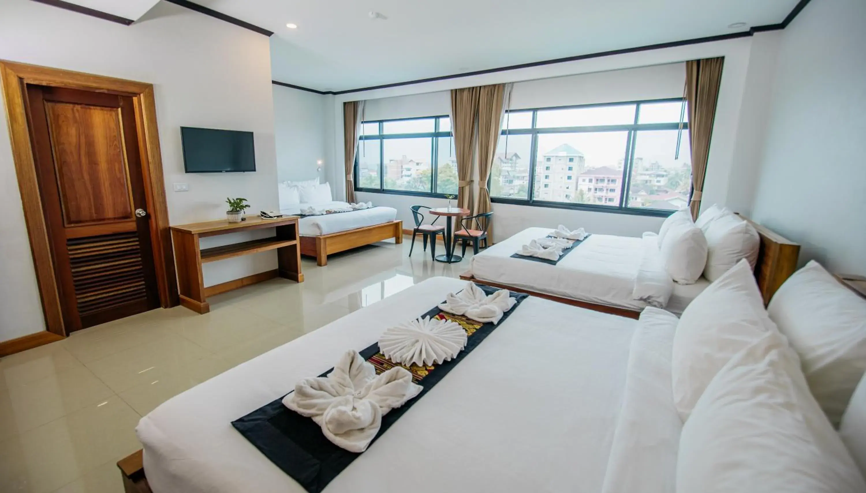 Bed in Sisombat Plaza Hotel Bed in Sisombat Plaza Hotel