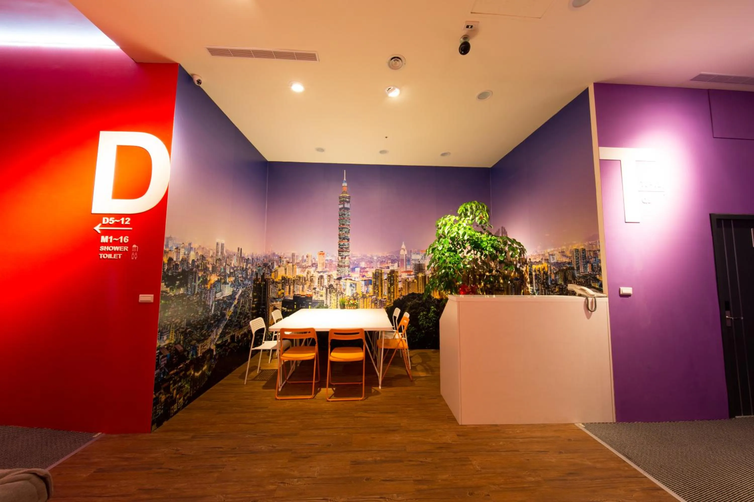 Seating area in SleepBox Hostel