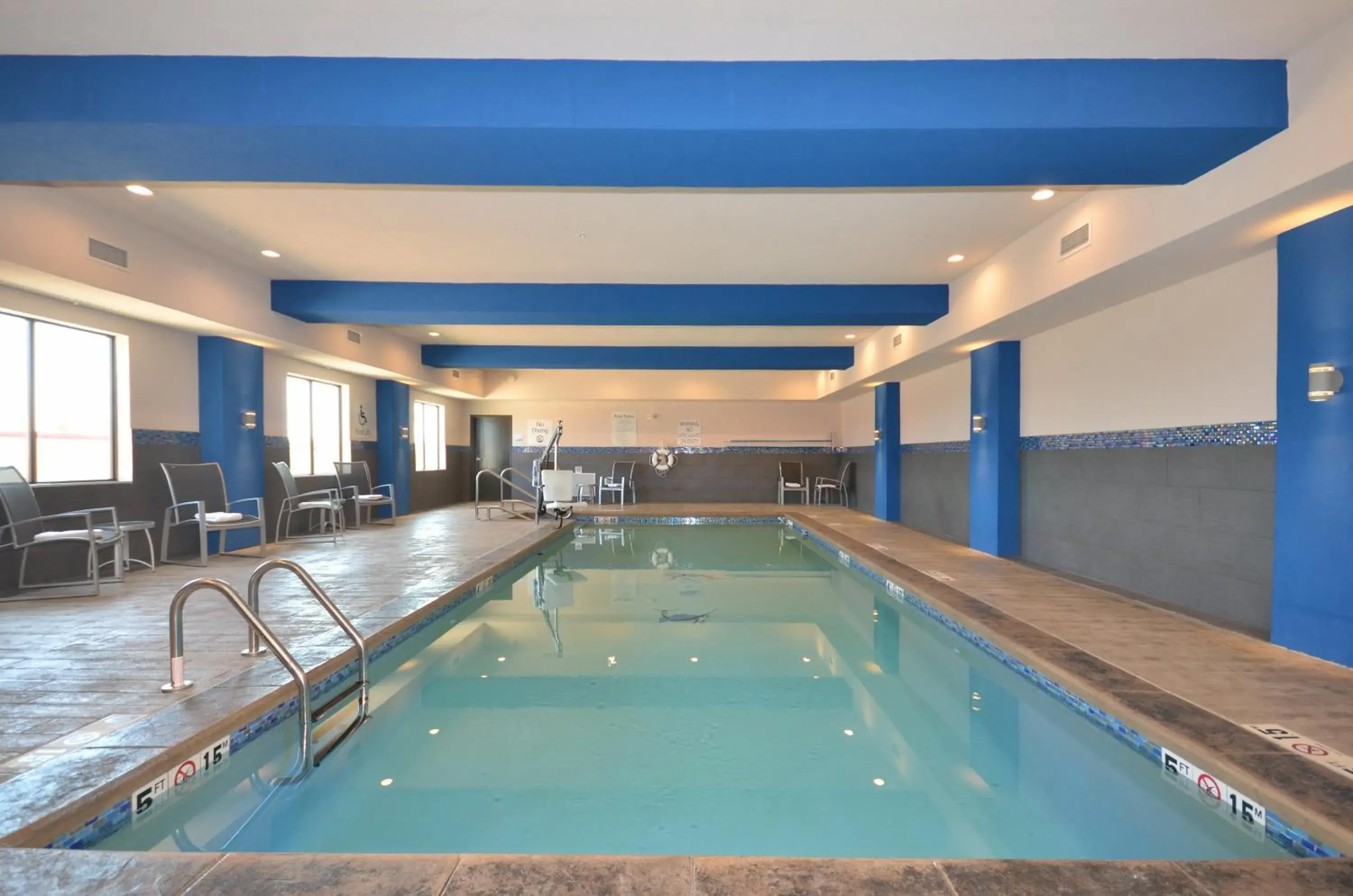 Swimming pool in Holiday Inn Express & Suites Oklahoma City Mid - Arpt Area by IHG Swimming pool in Holiday Inn Express & Suites Oklahoma City Mid - Arpt Area by IHG