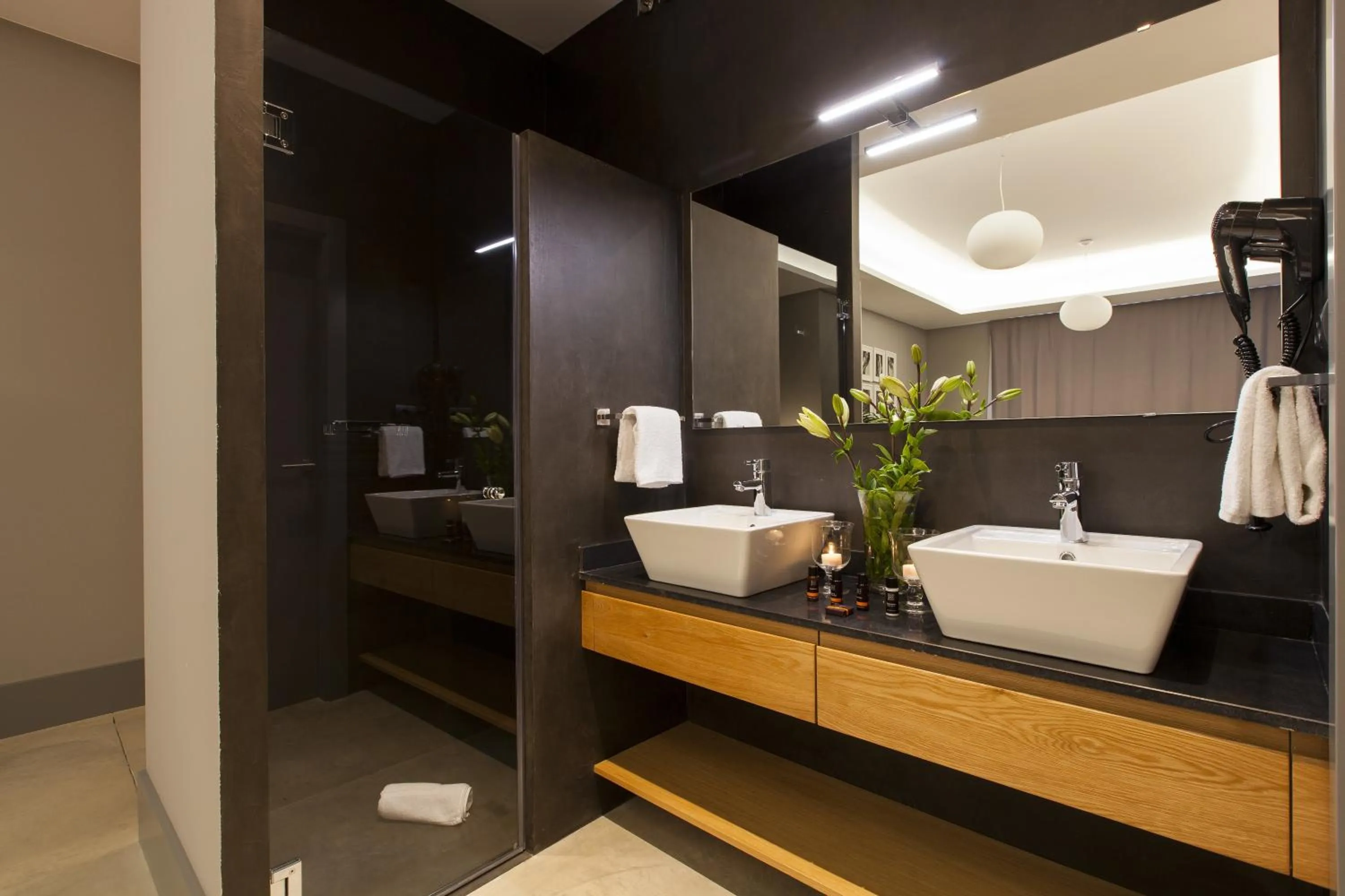 Shower in Kare No Apartments by Sitges Group