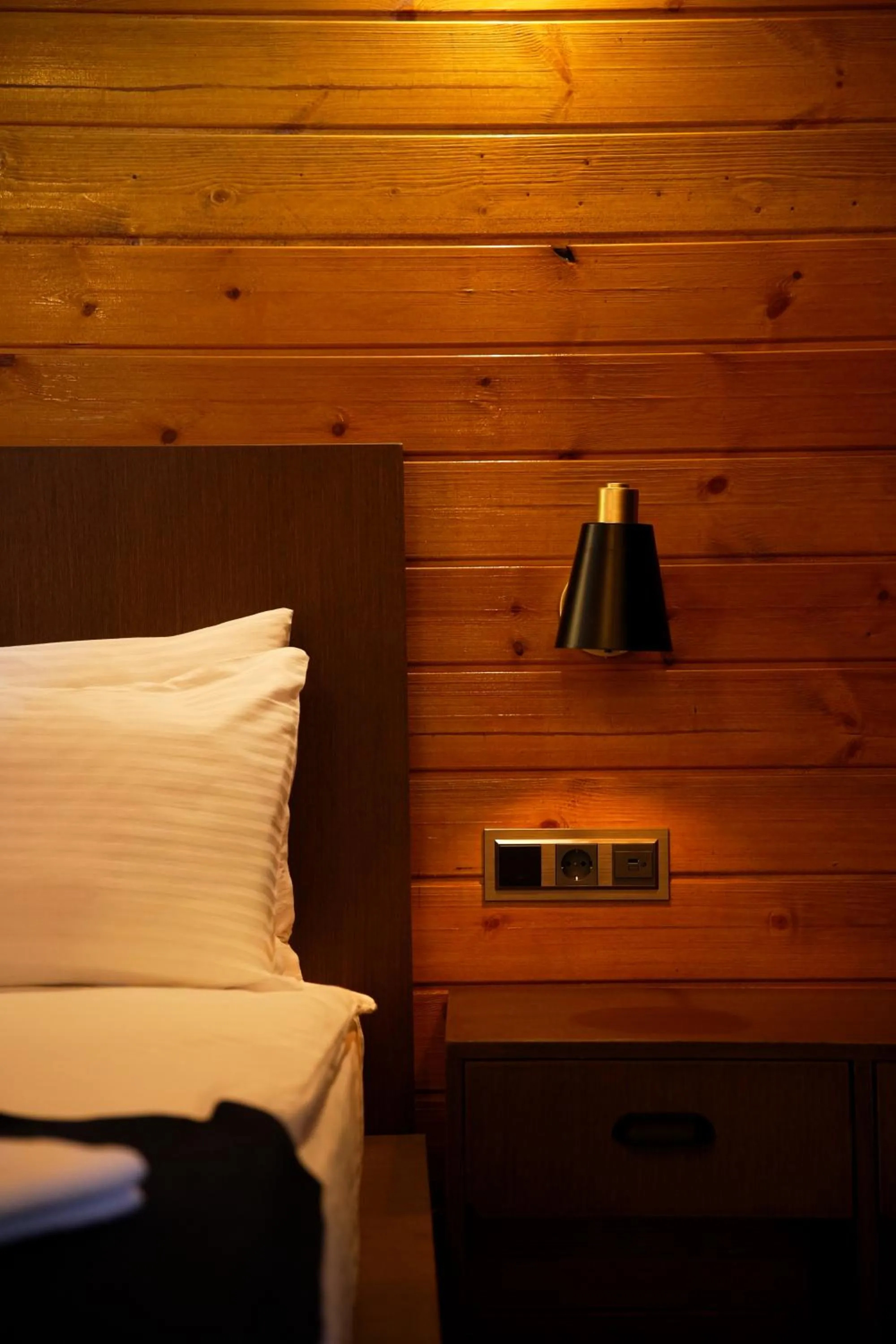 Bed in Navy Inn & Bungalows