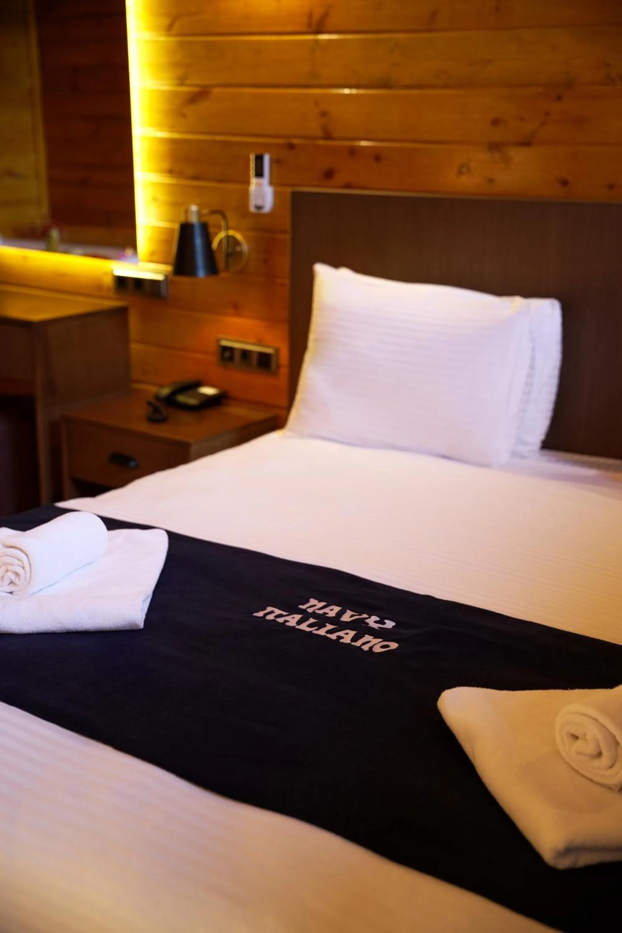 Bed in Navy Inn & Bungalows