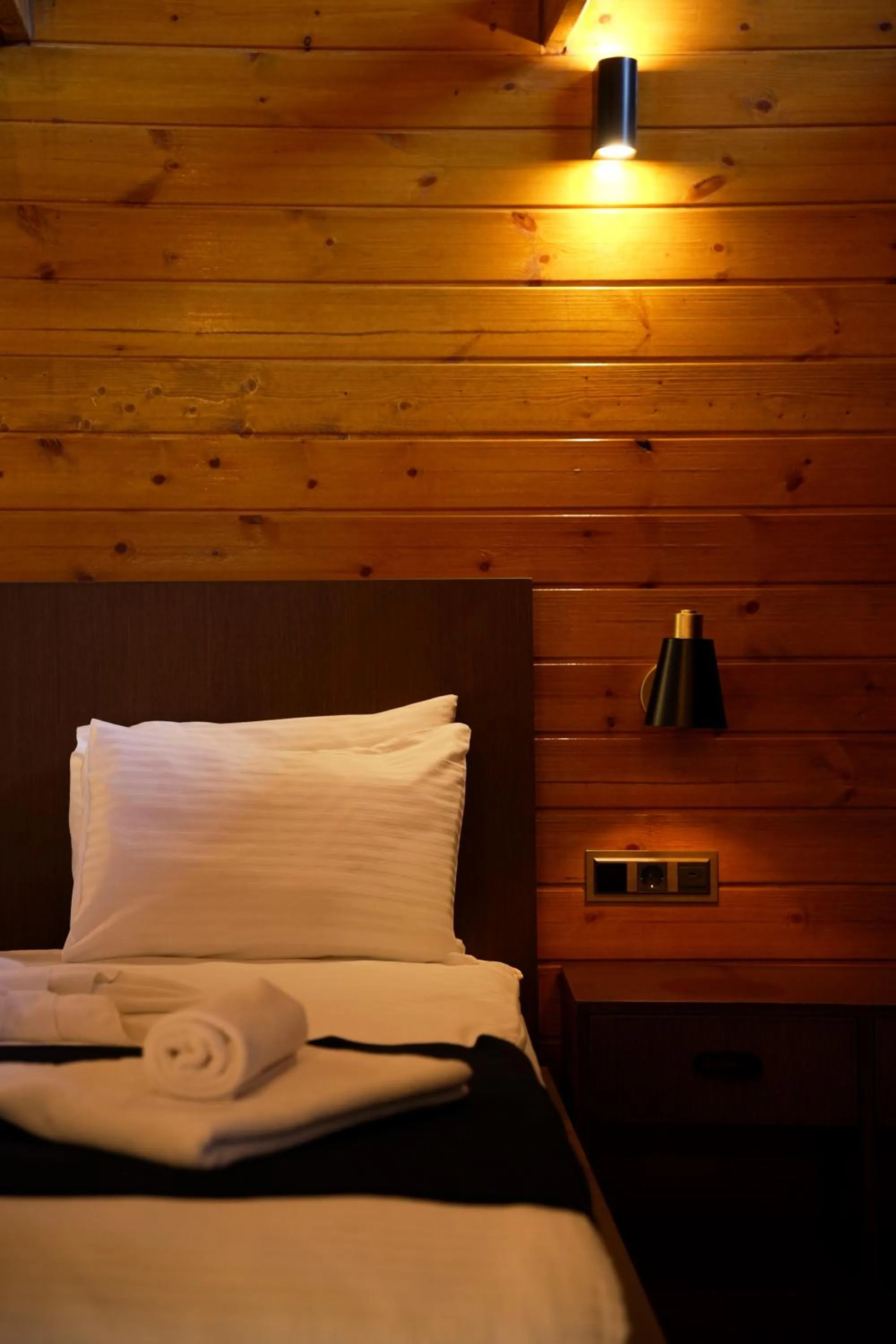 Bed in Navy Inn & Bungalows