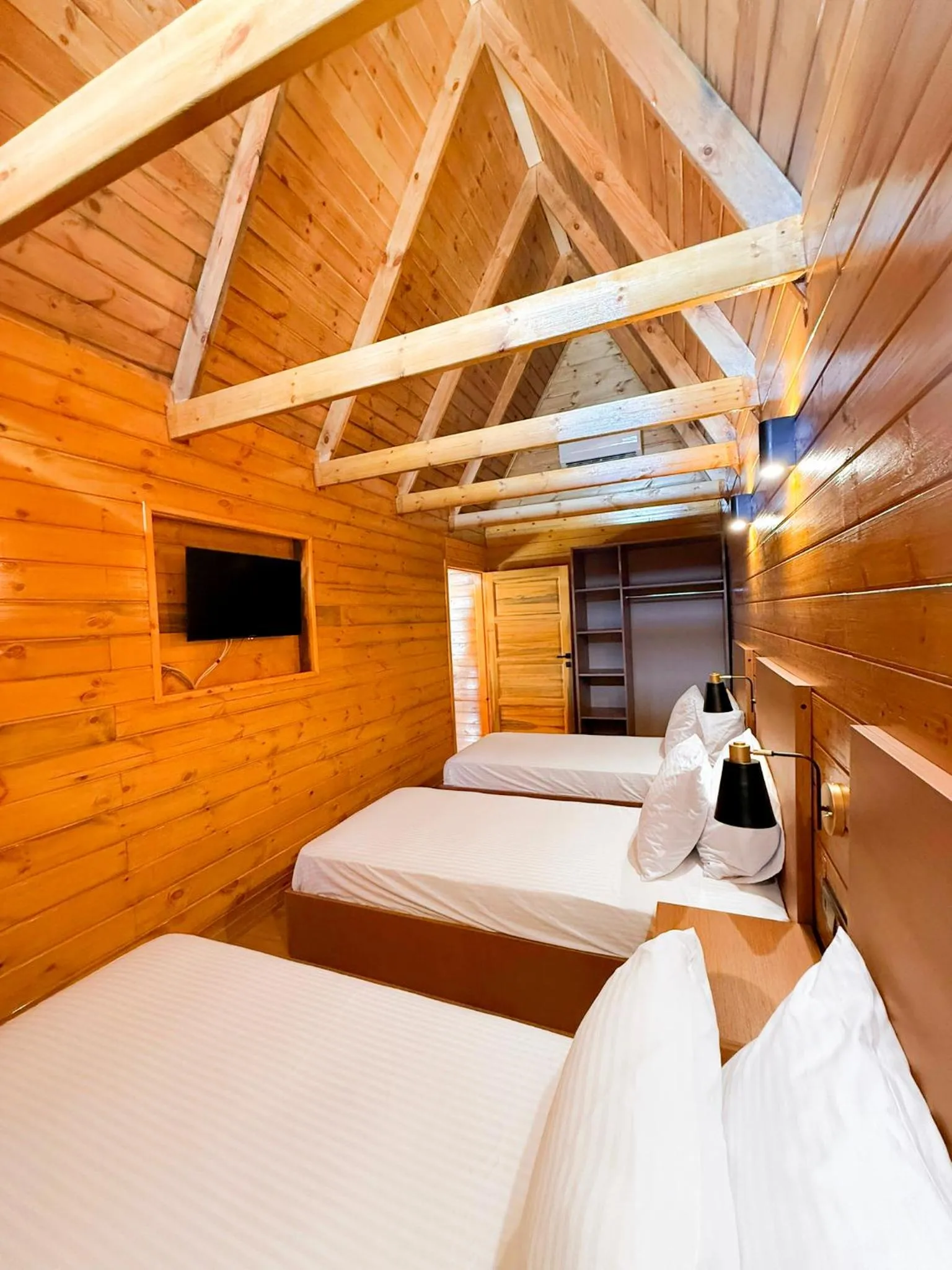 Bed in Navy Inn & Bungalows