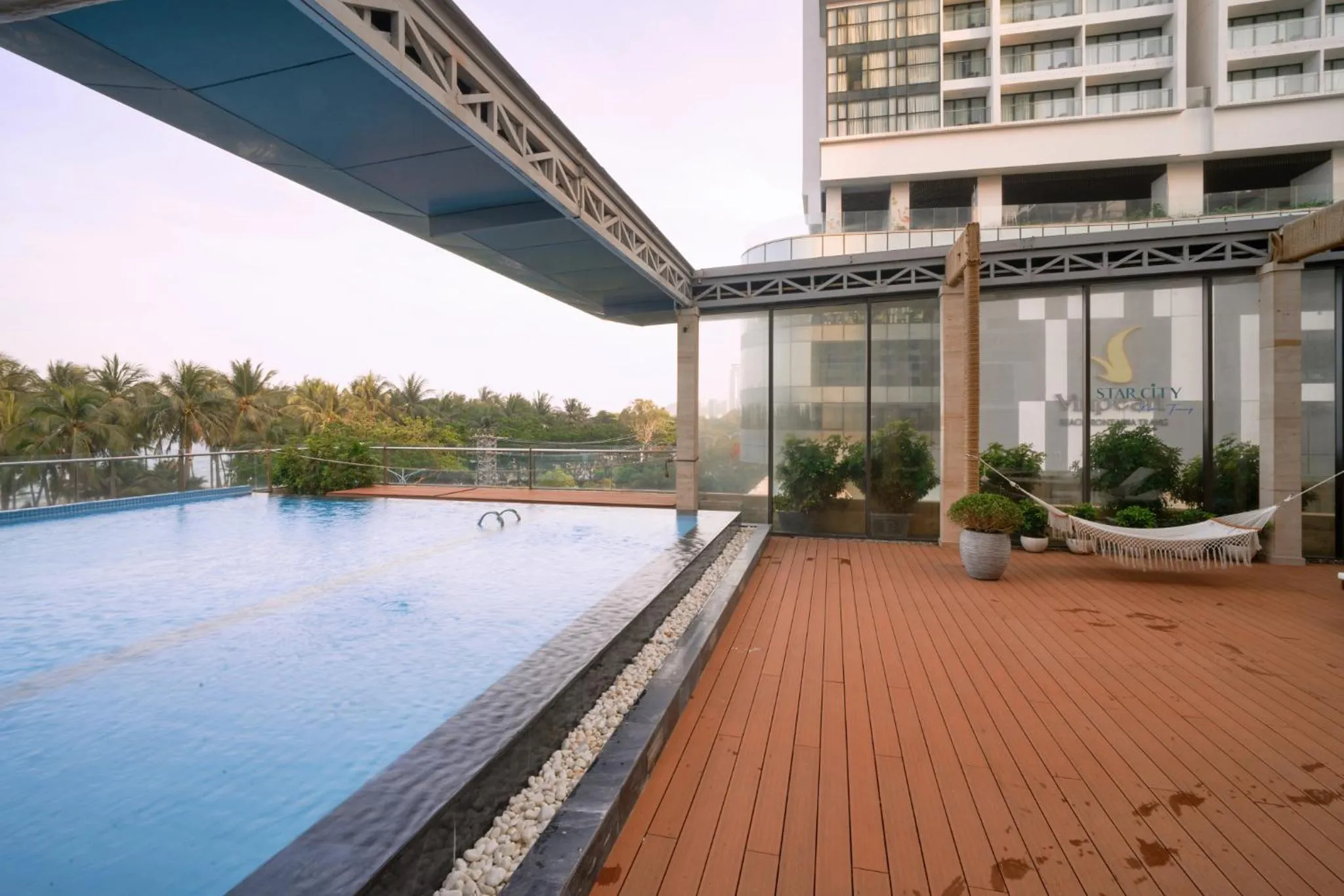 Swimming pool in S Lux Apartment Starcity with Sea View