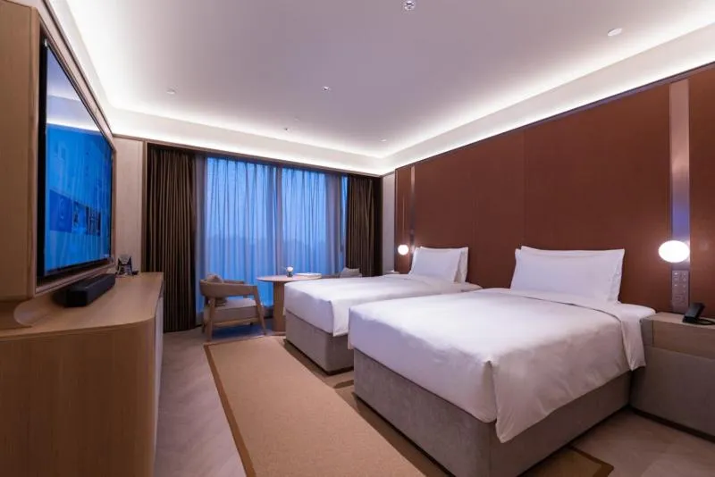 Bed in Shanghai Changfeng Business District Orange Crystal Hotel