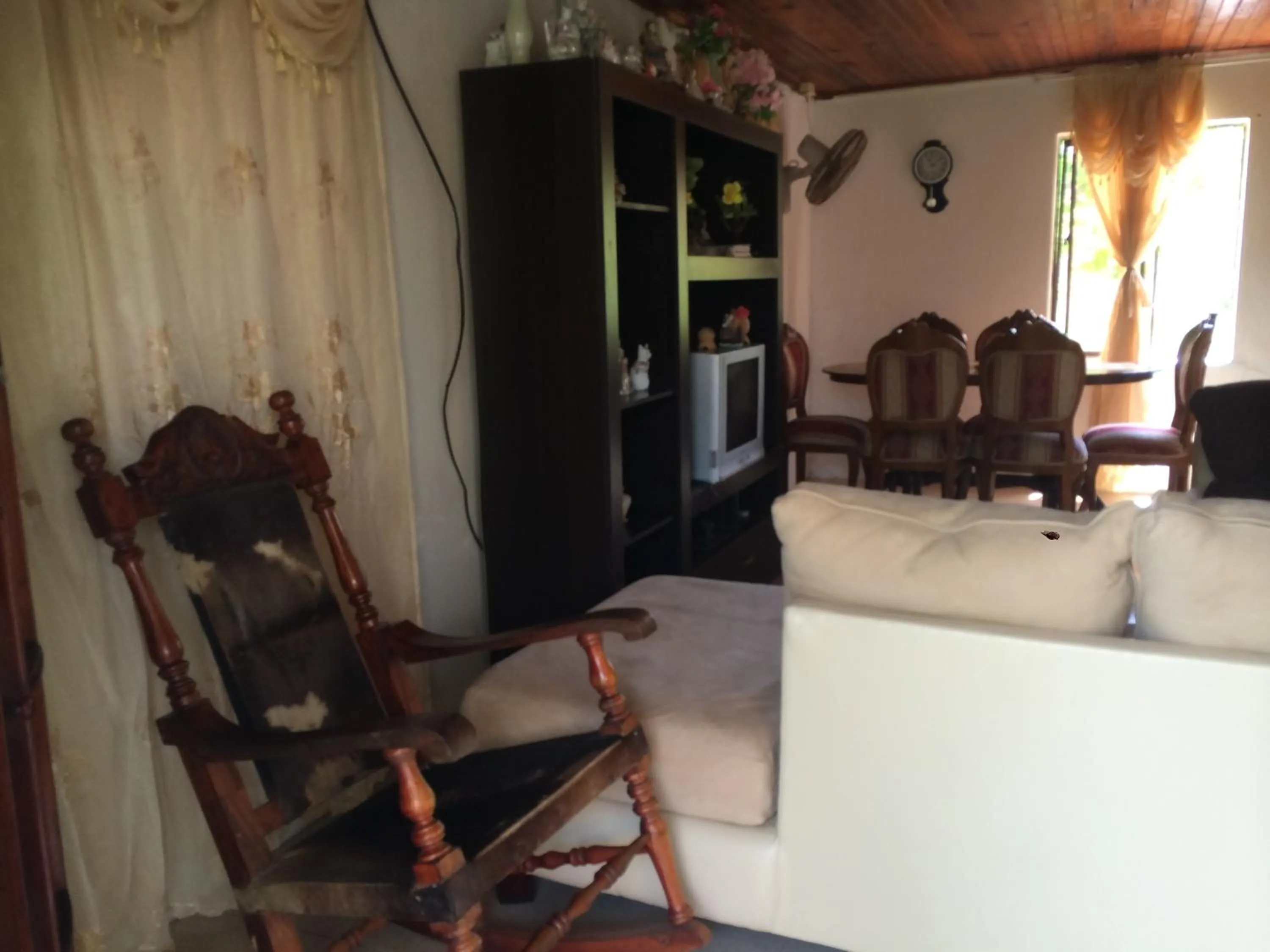 Communal lounge/ TV room in Posada Miss Portia