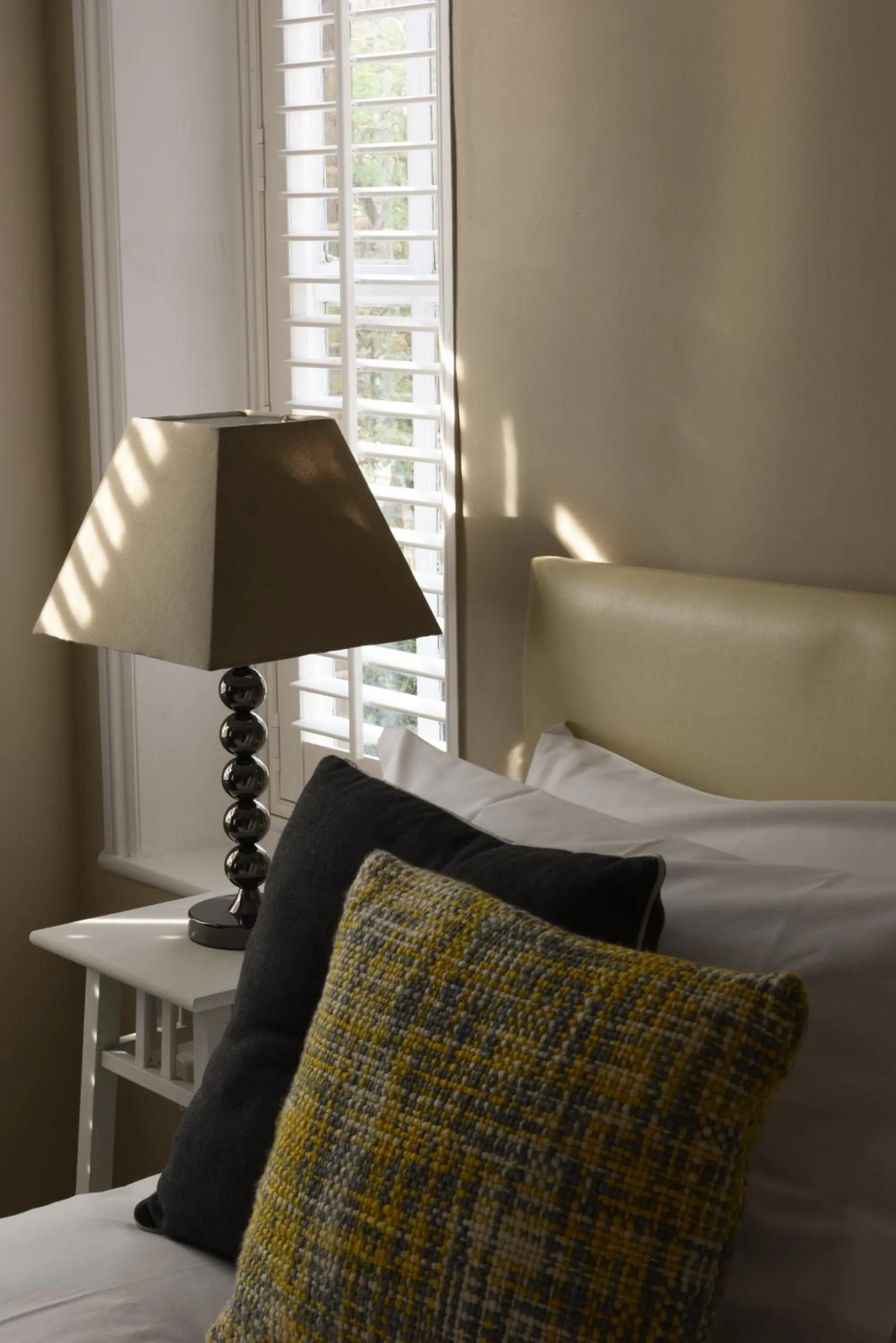 Bed in Woodstock Suites