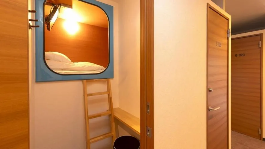 Bed in New Gloria Oita Hotel