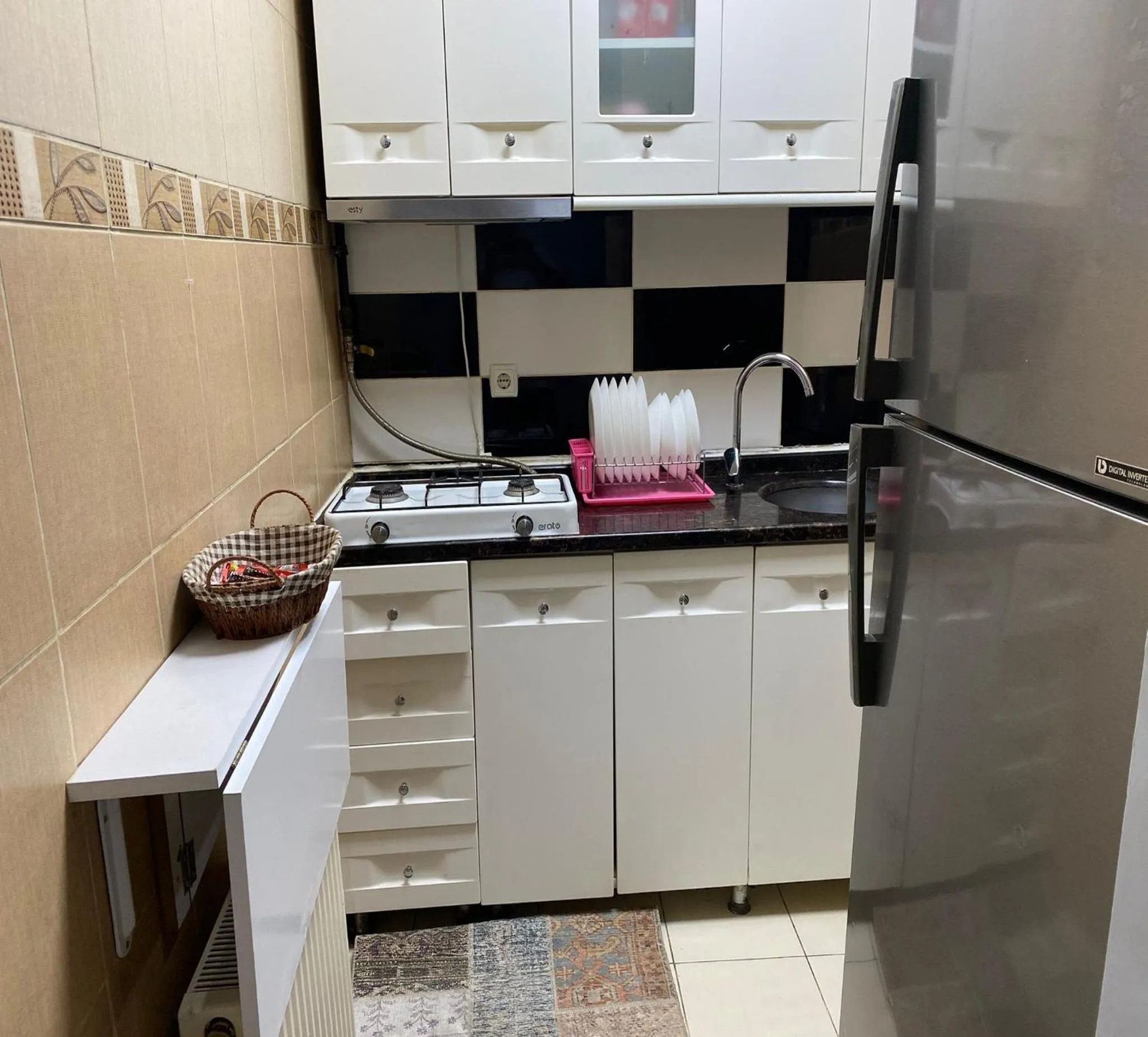 kitchen in Unique Suite Hotel