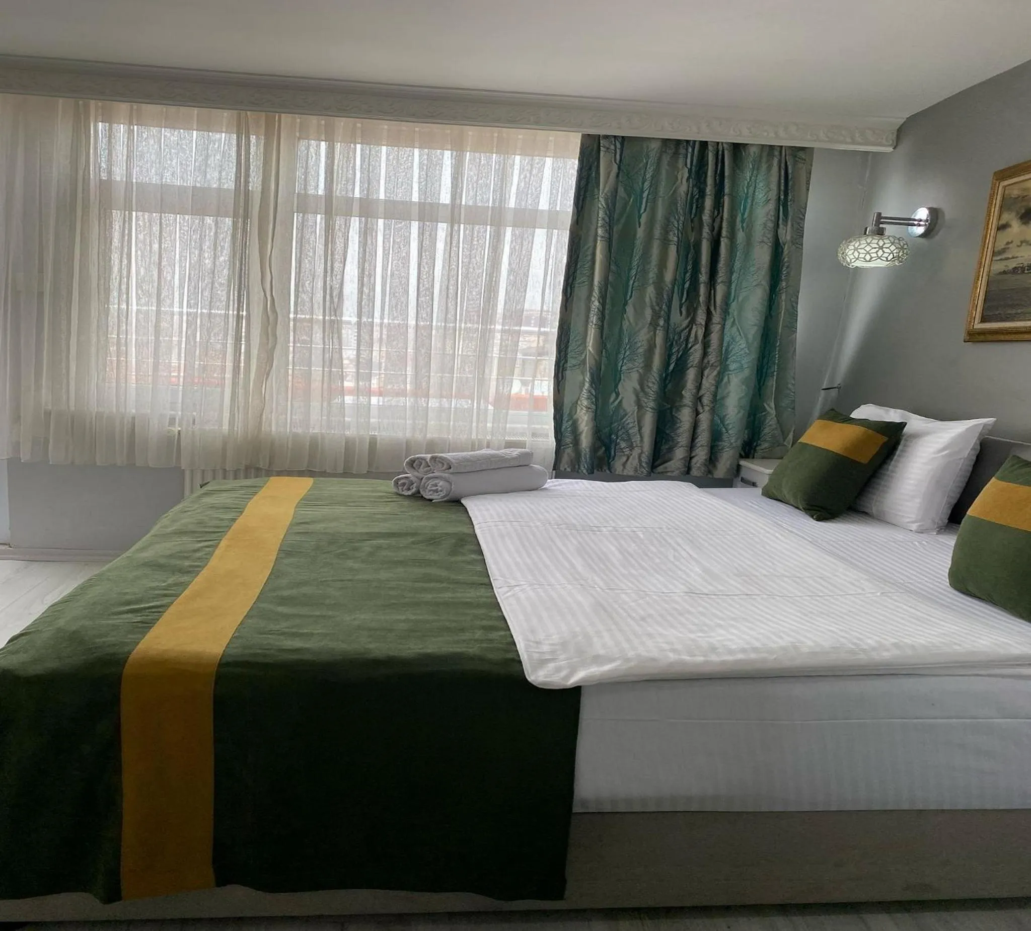 Bed in Unique Suite Hotel