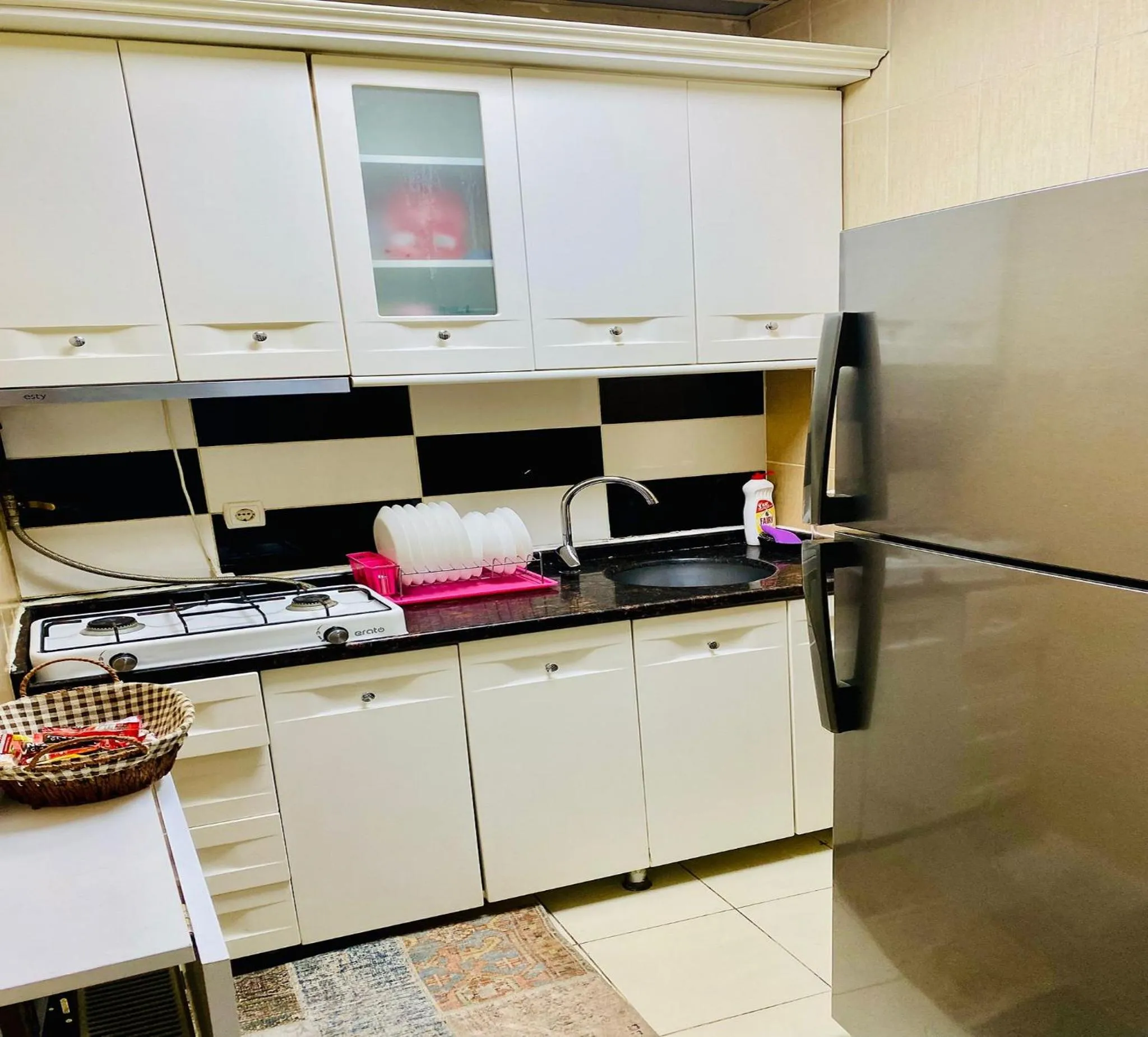 kitchen in Unique Suite Hotel