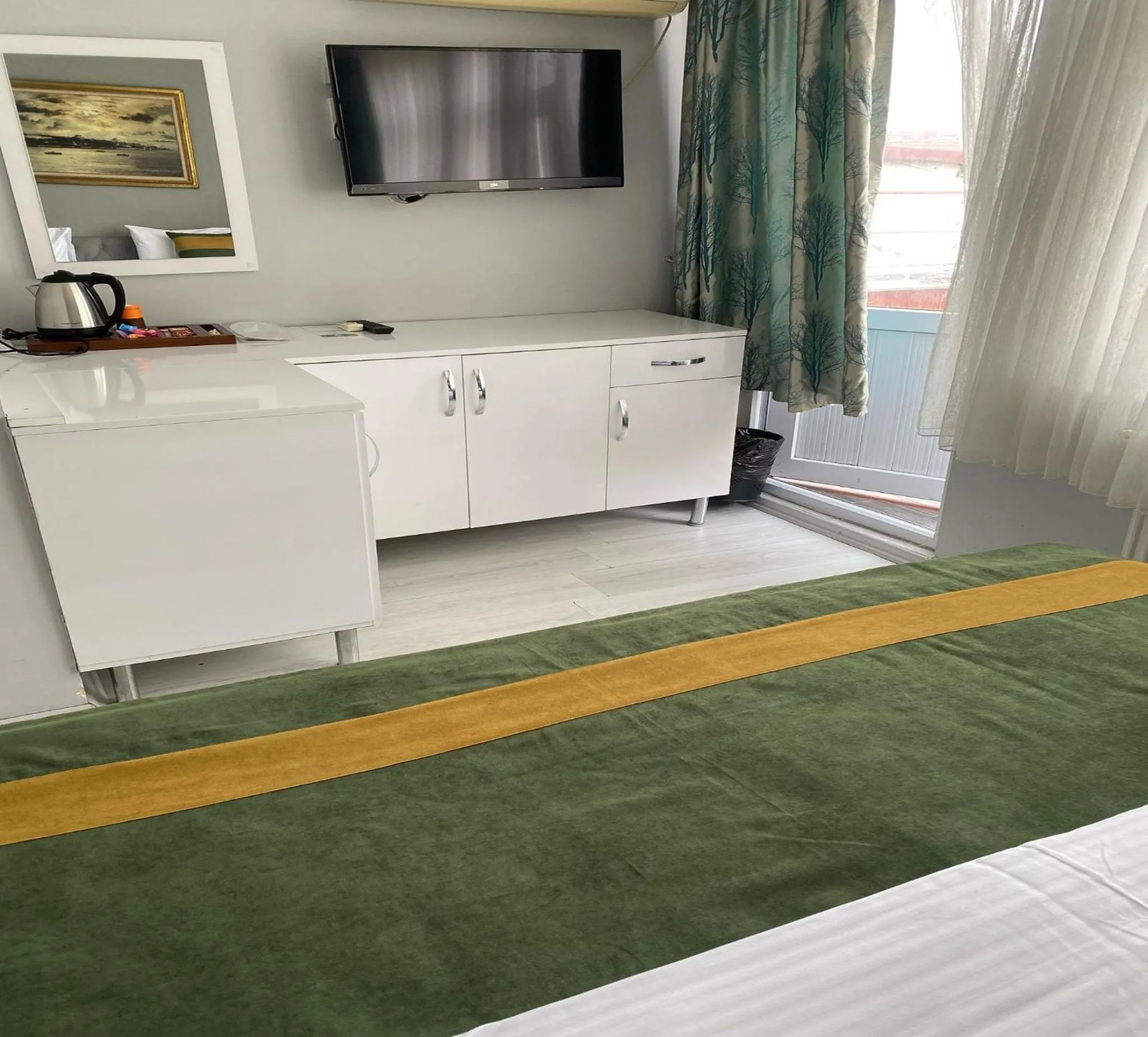 Bed in Unique Suite Hotel