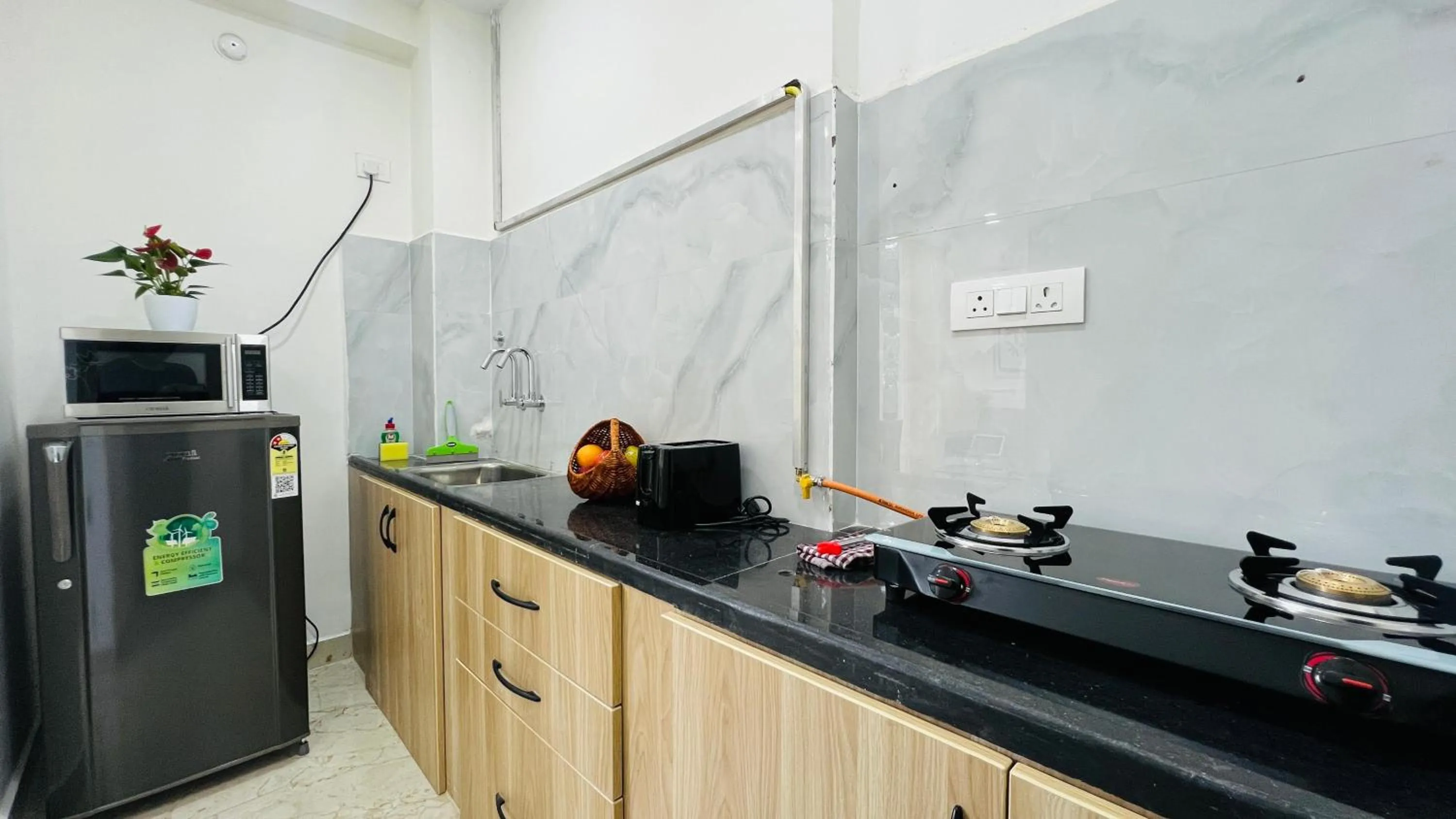 Kitchen or kitchenette in Olive Serviced Apartments - HICC Hitex Hyderabad