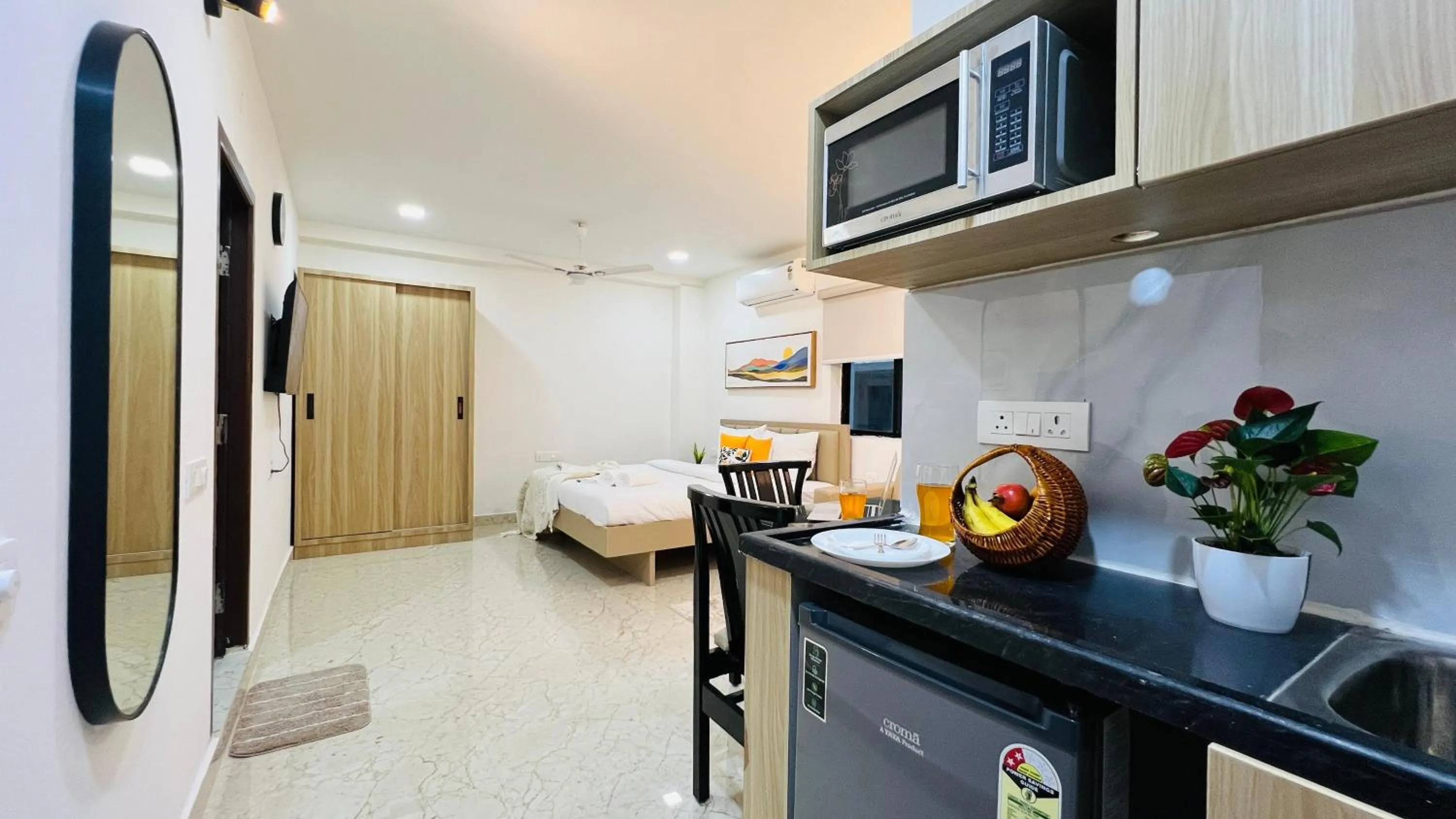 Kitchen or kitchenette in Olive Serviced Apartments - HICC Hitex Hyderabad