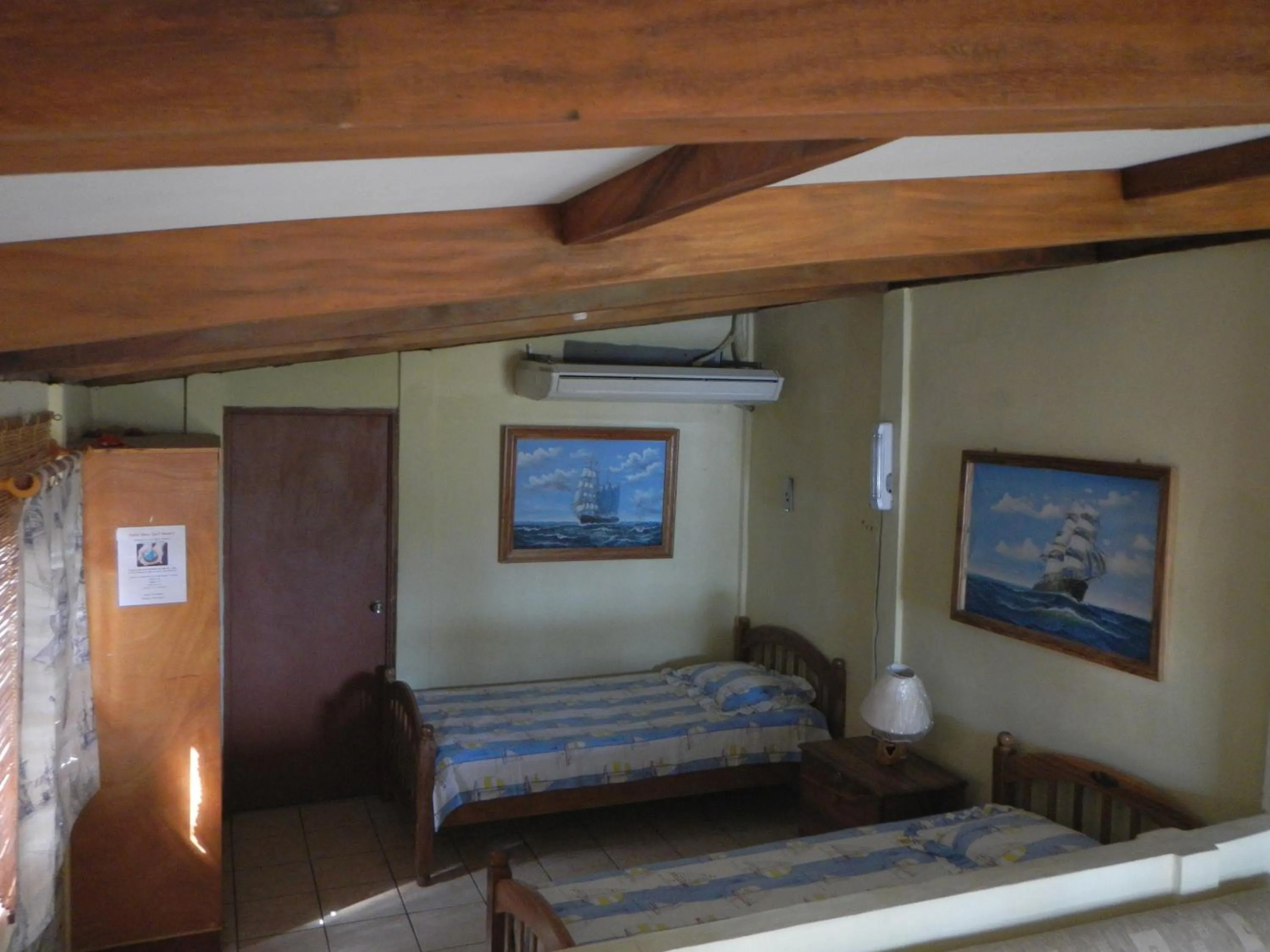 Photo of the whole room, Bed in Punta Roca Surf Resort