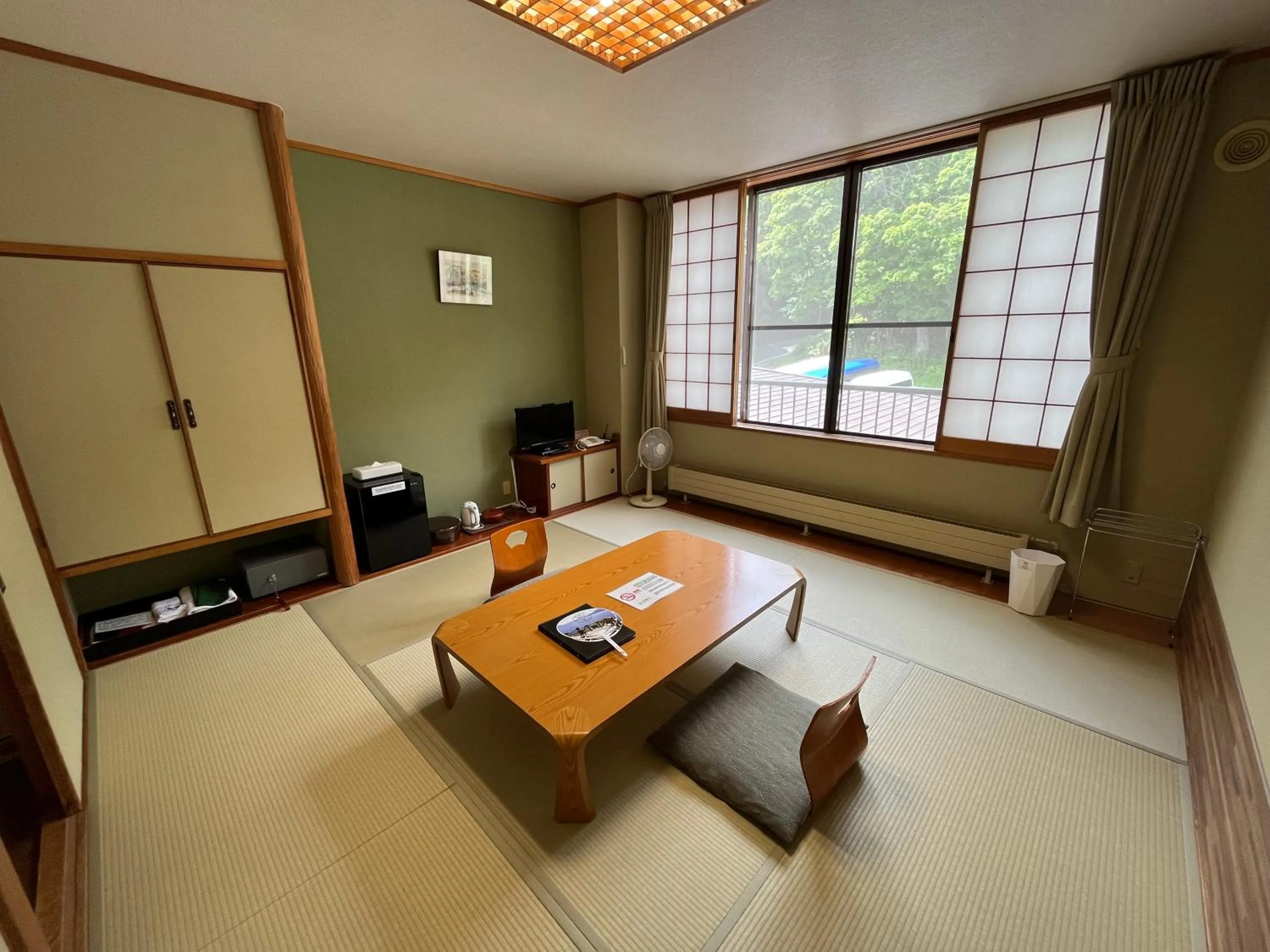Living room in Sapporo's Secret Onsen Sanctuary Marukoma Onsen Ryokan