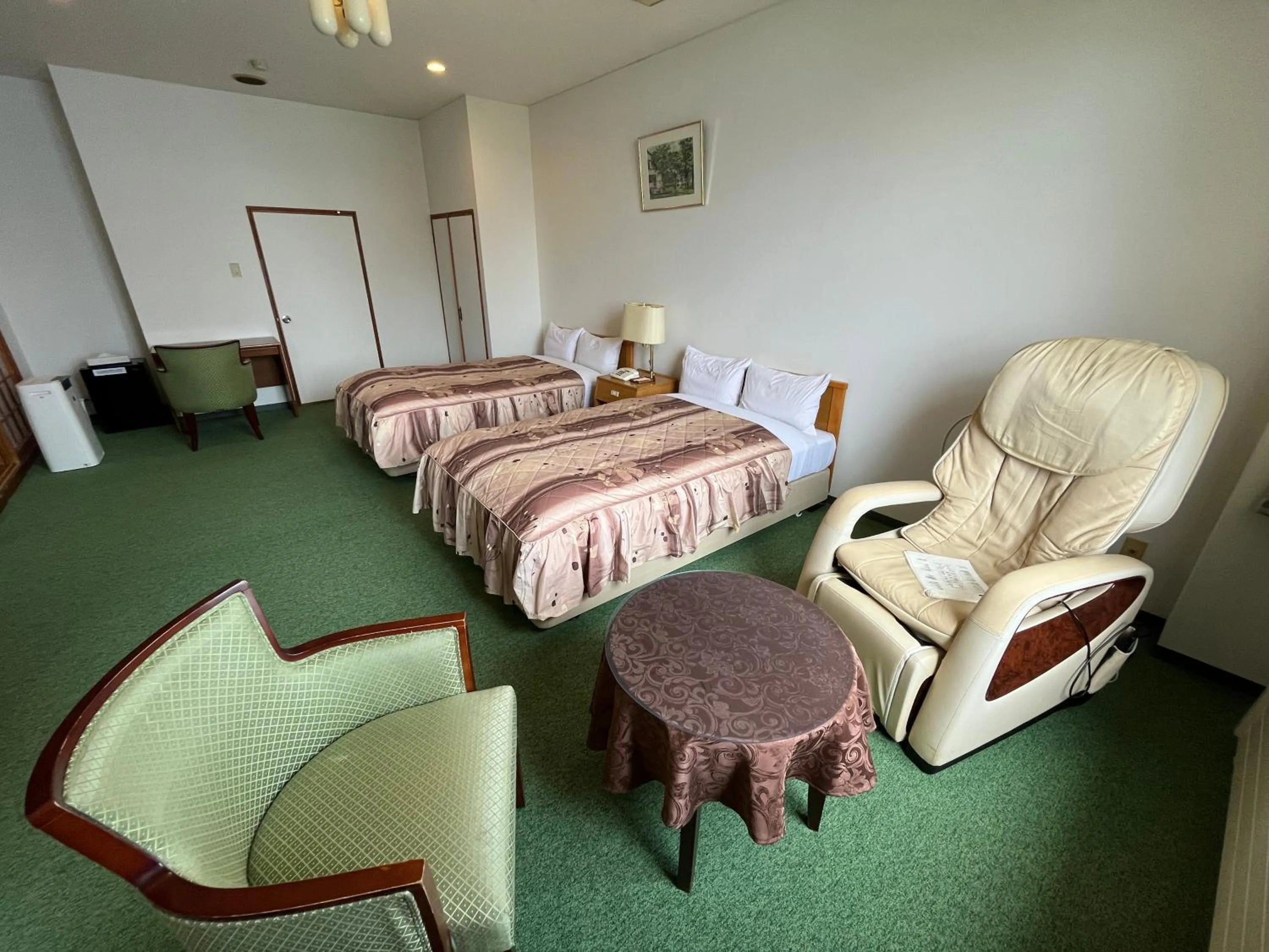 Seating area, Bed in Sapporo's Secret Onsen Sanctuary Marukoma Onsen Ryokan