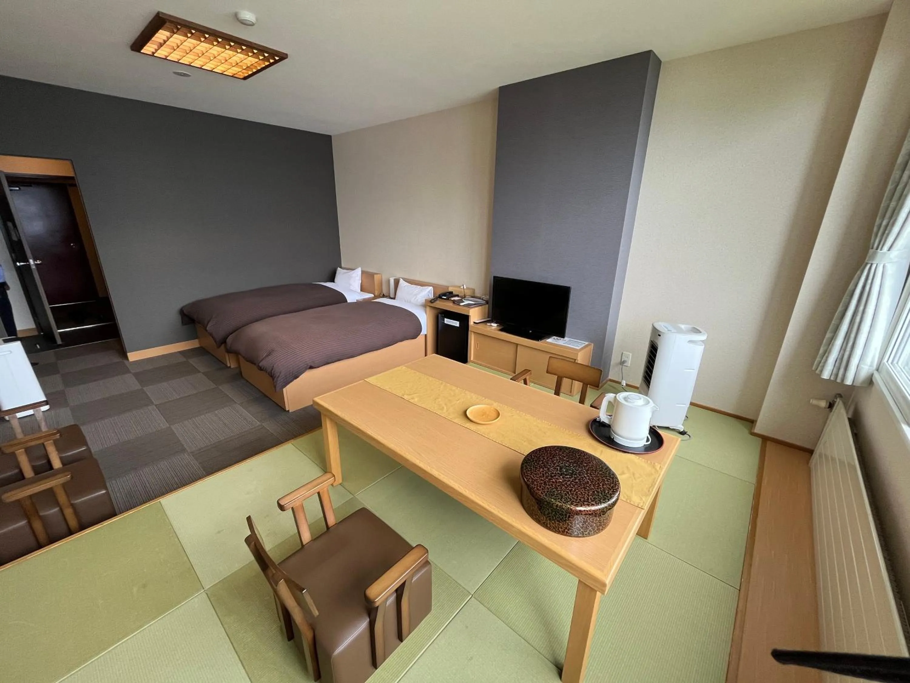 Living room in Sapporo's Secret Onsen Sanctuary Marukoma Onsen Ryokan