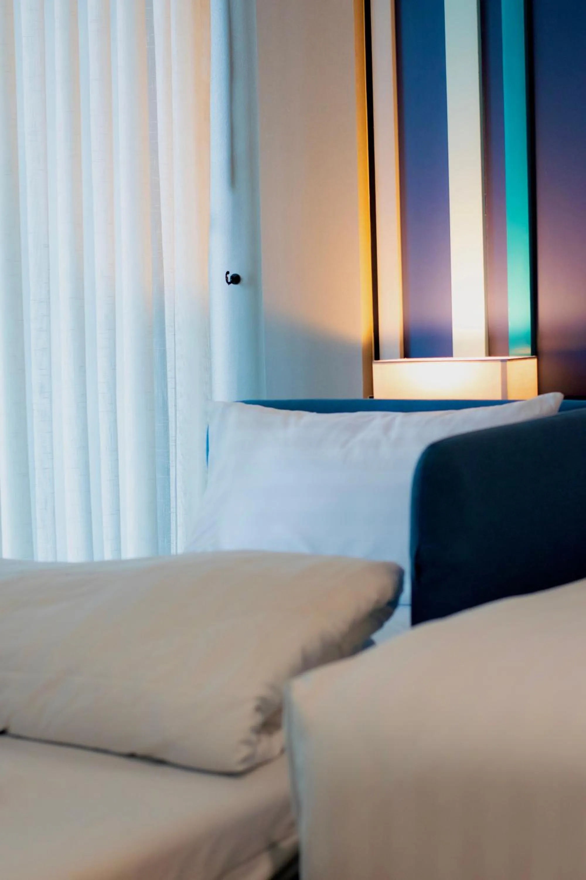 Bed in @T Boutique Hotel