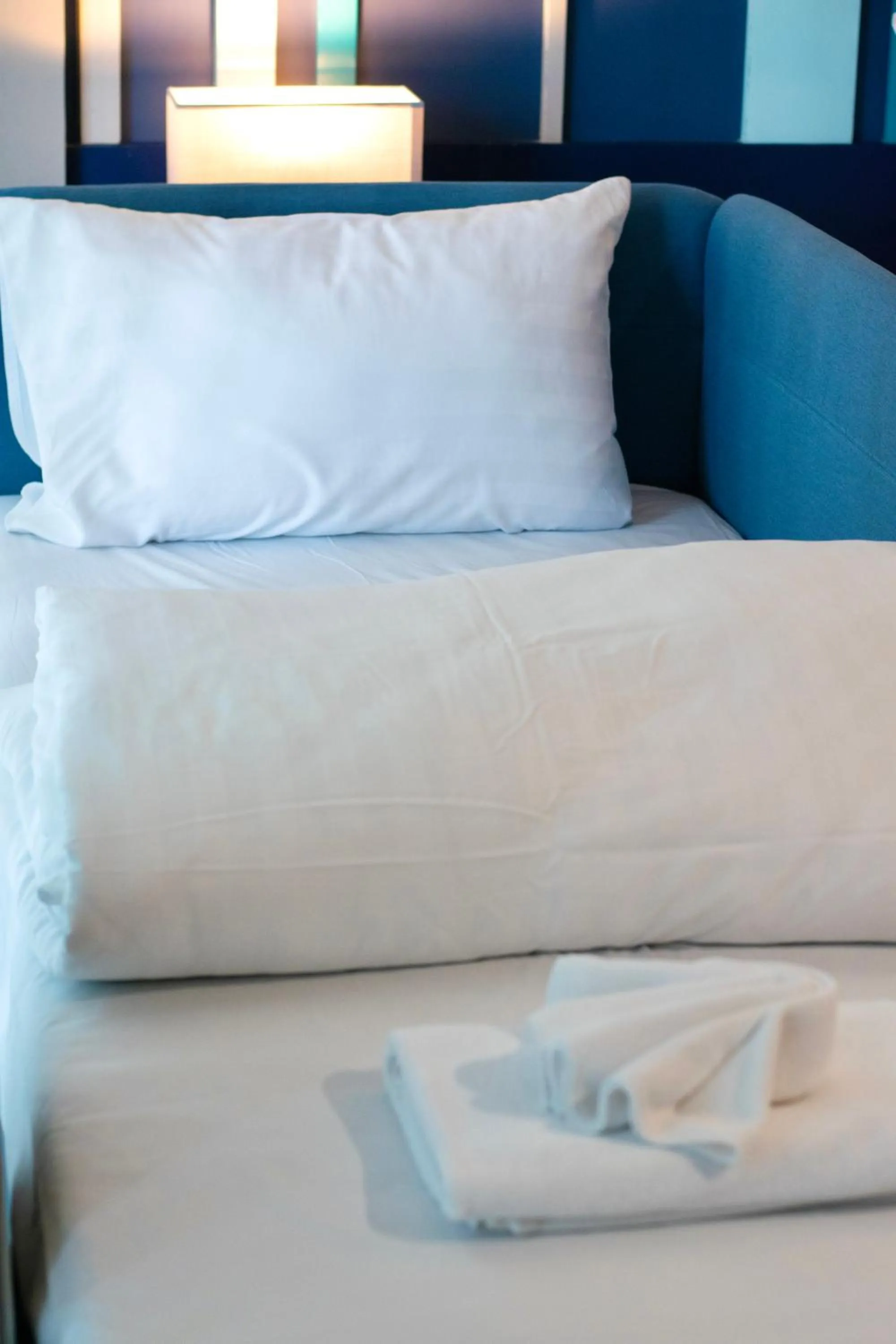 Bed in @T Boutique Hotel