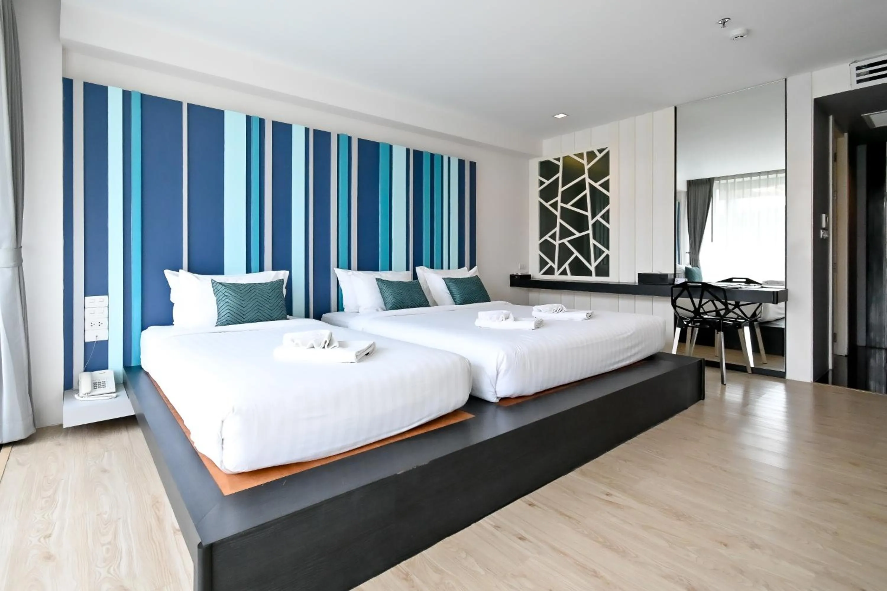 Bedroom, Bed in @T Boutique Hotel