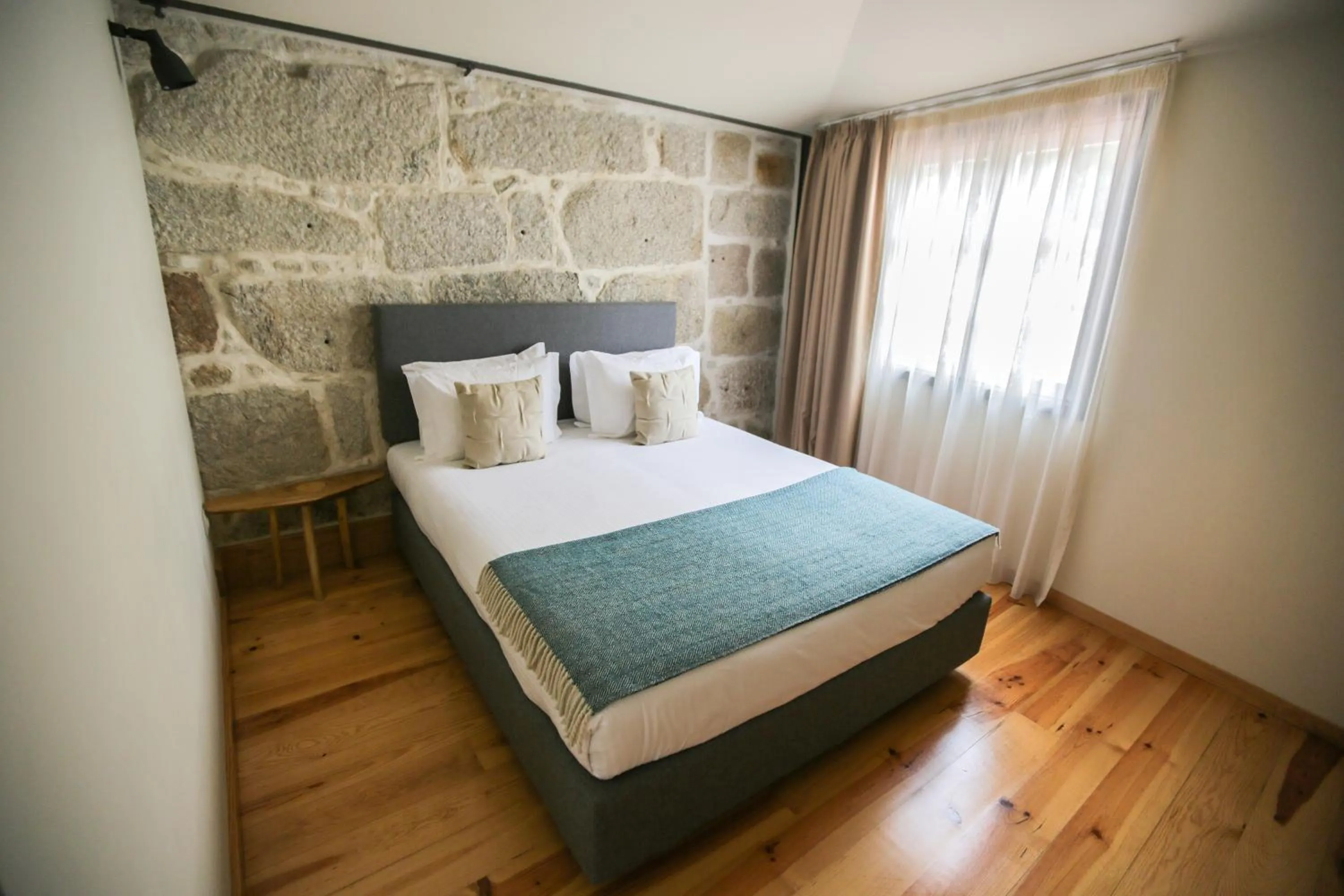 Bed in My Ribeira Guest House