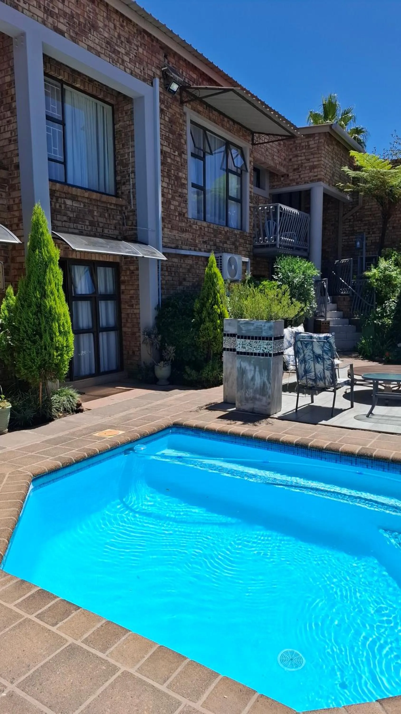 Swimming pool in Dormio Manor Guest Lodge