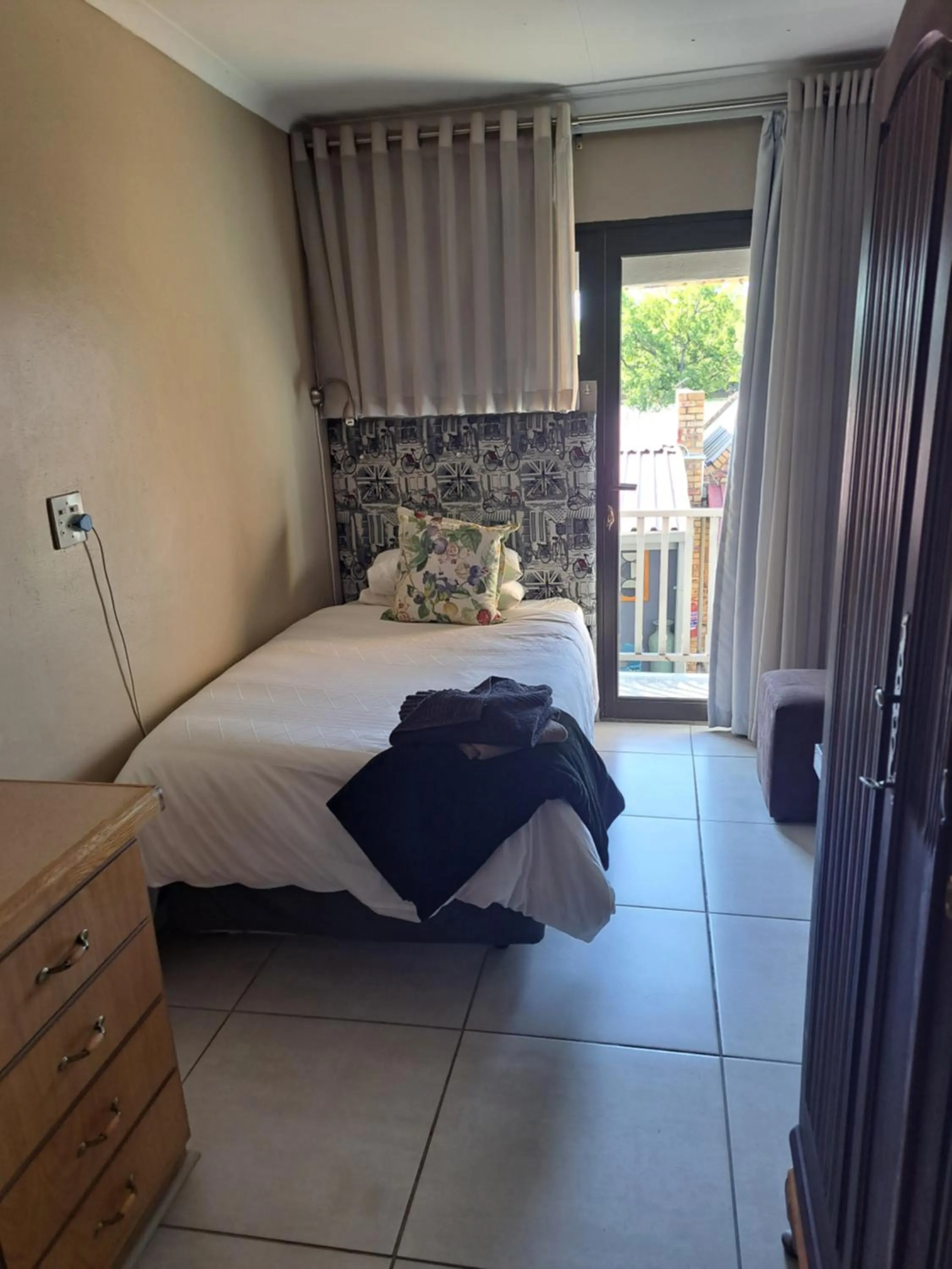 Bed in Dormio Manor Guest Lodge