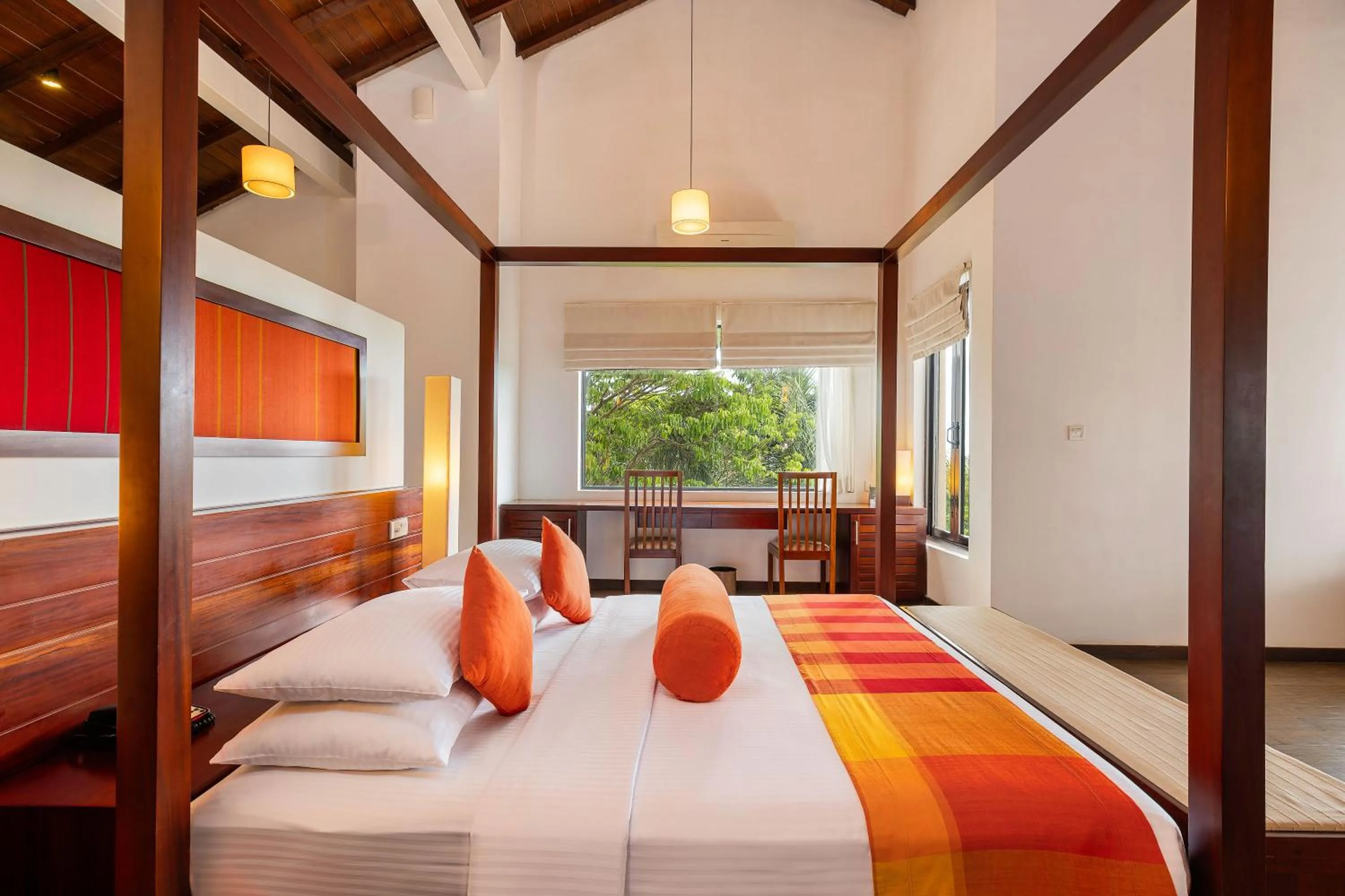 Bed in The Calm Resort & Spa