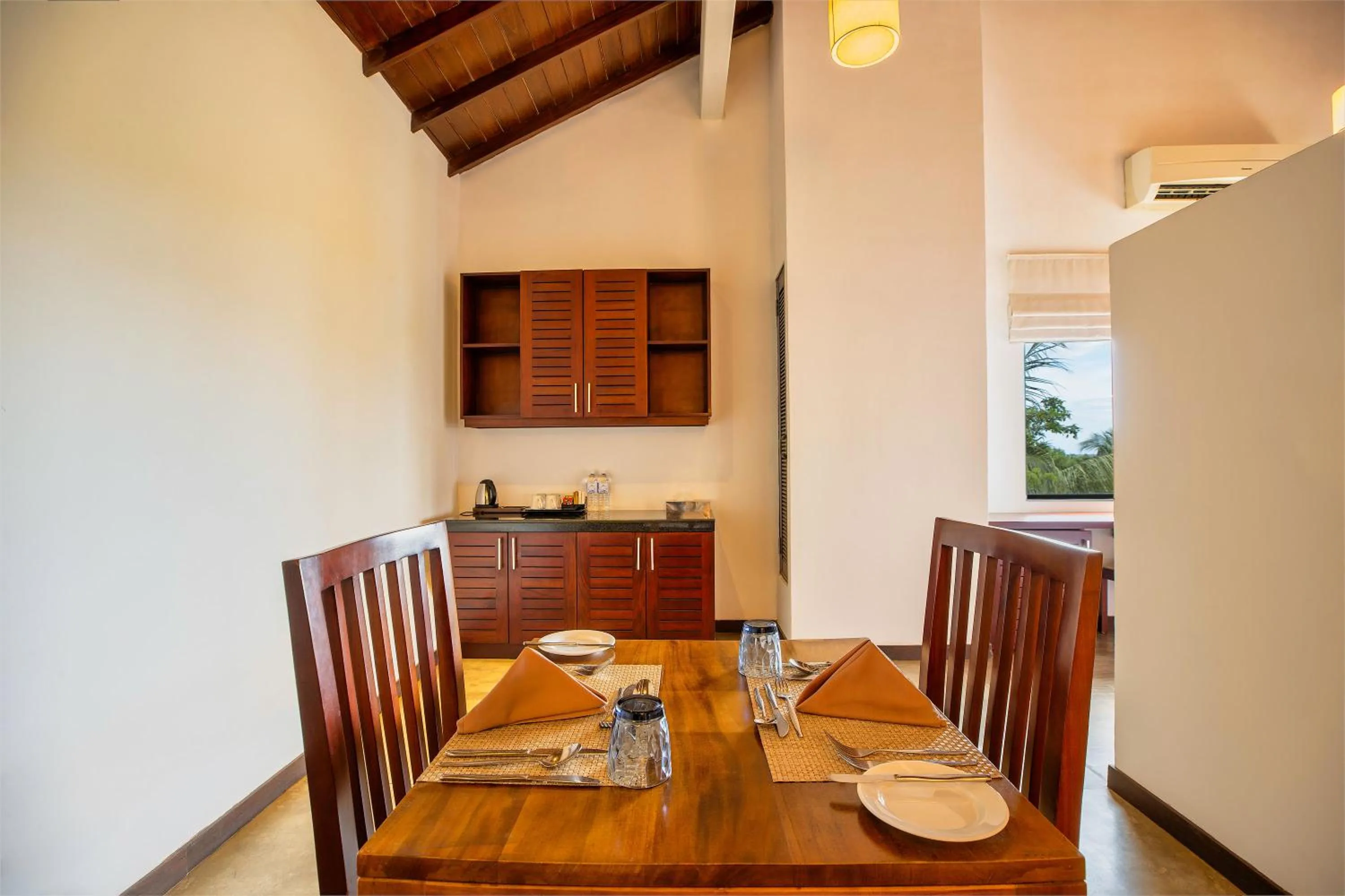 Kitchen or kitchenette in The Calm Resort & Spa