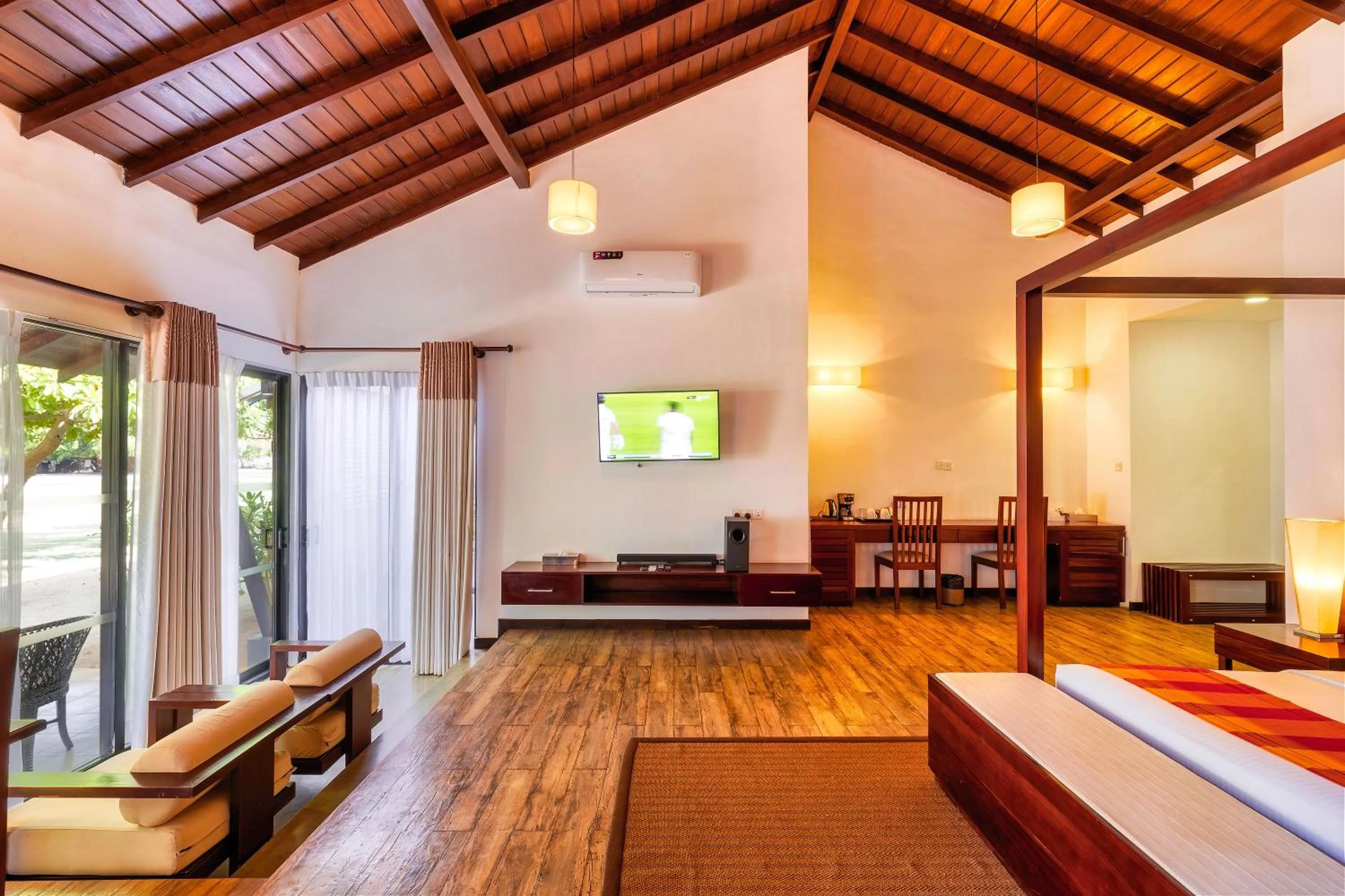 Bed in The Calm Resort & Spa