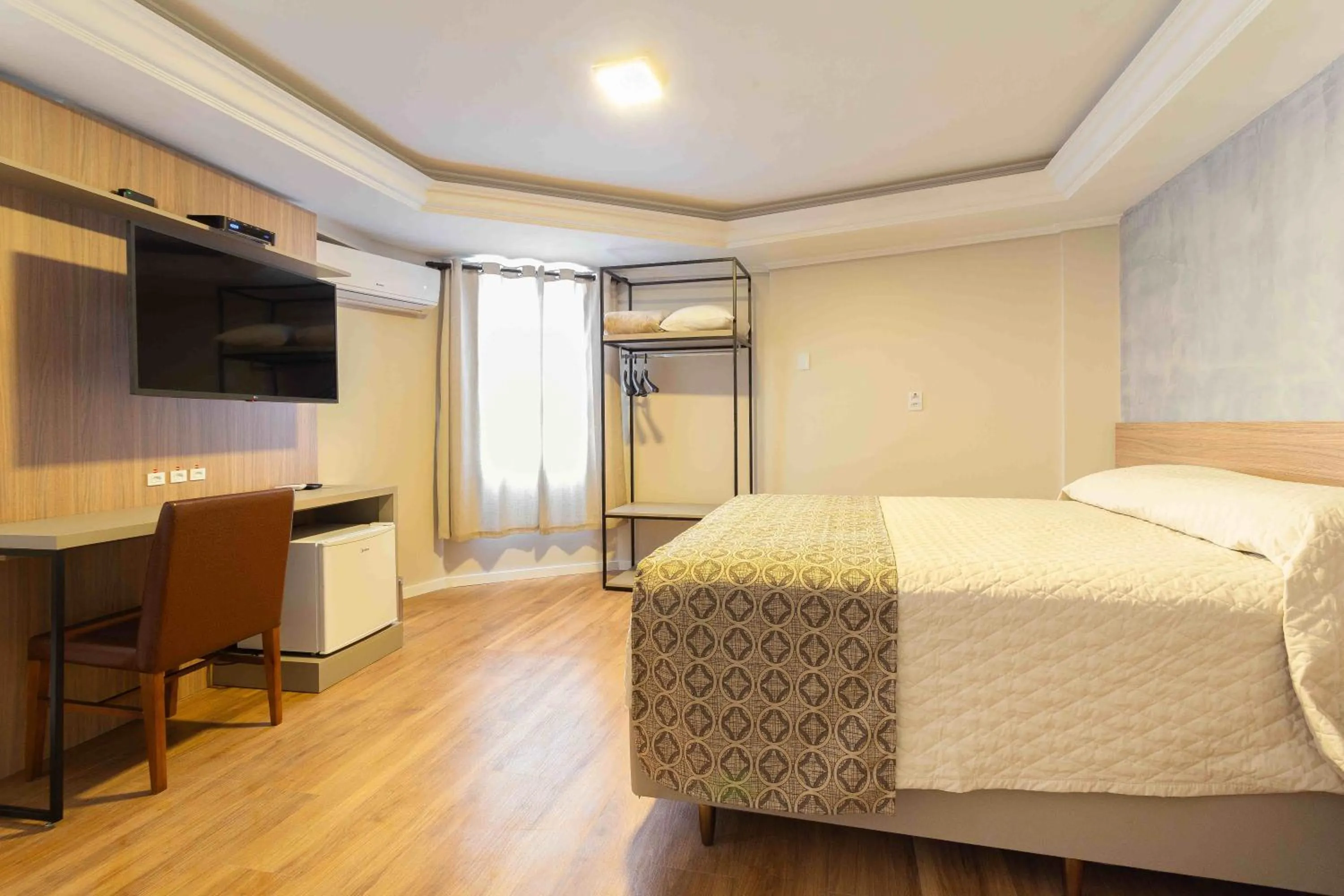 Bed in Hotel Dom Rafael Executivo