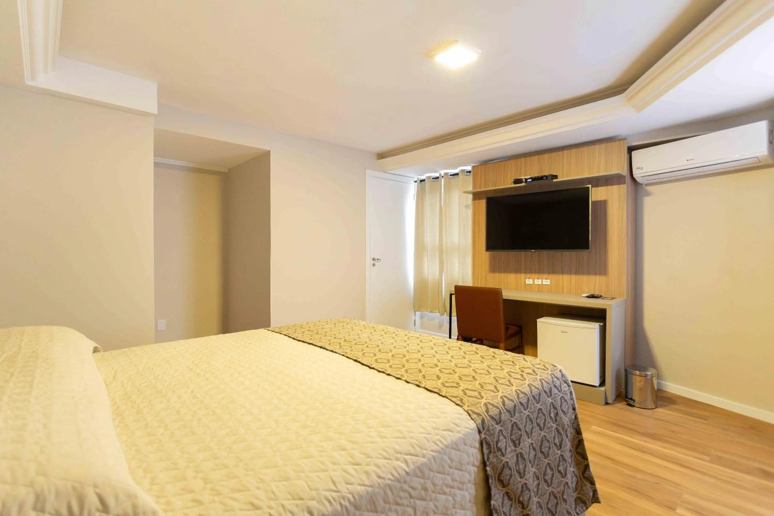 Bed in Hotel Dom Rafael Executivo