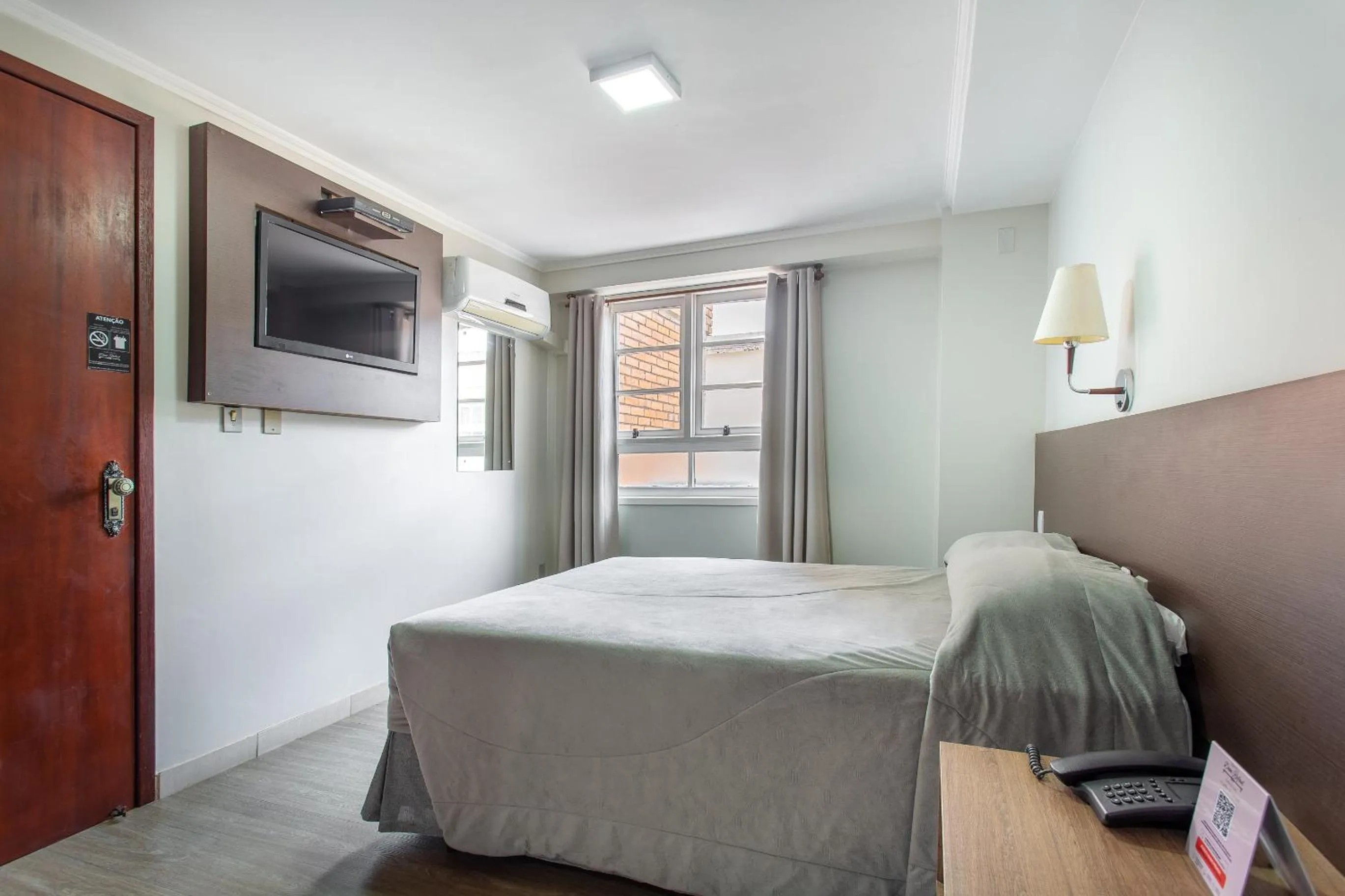 Bed in Hotel Dom Rafael Executivo