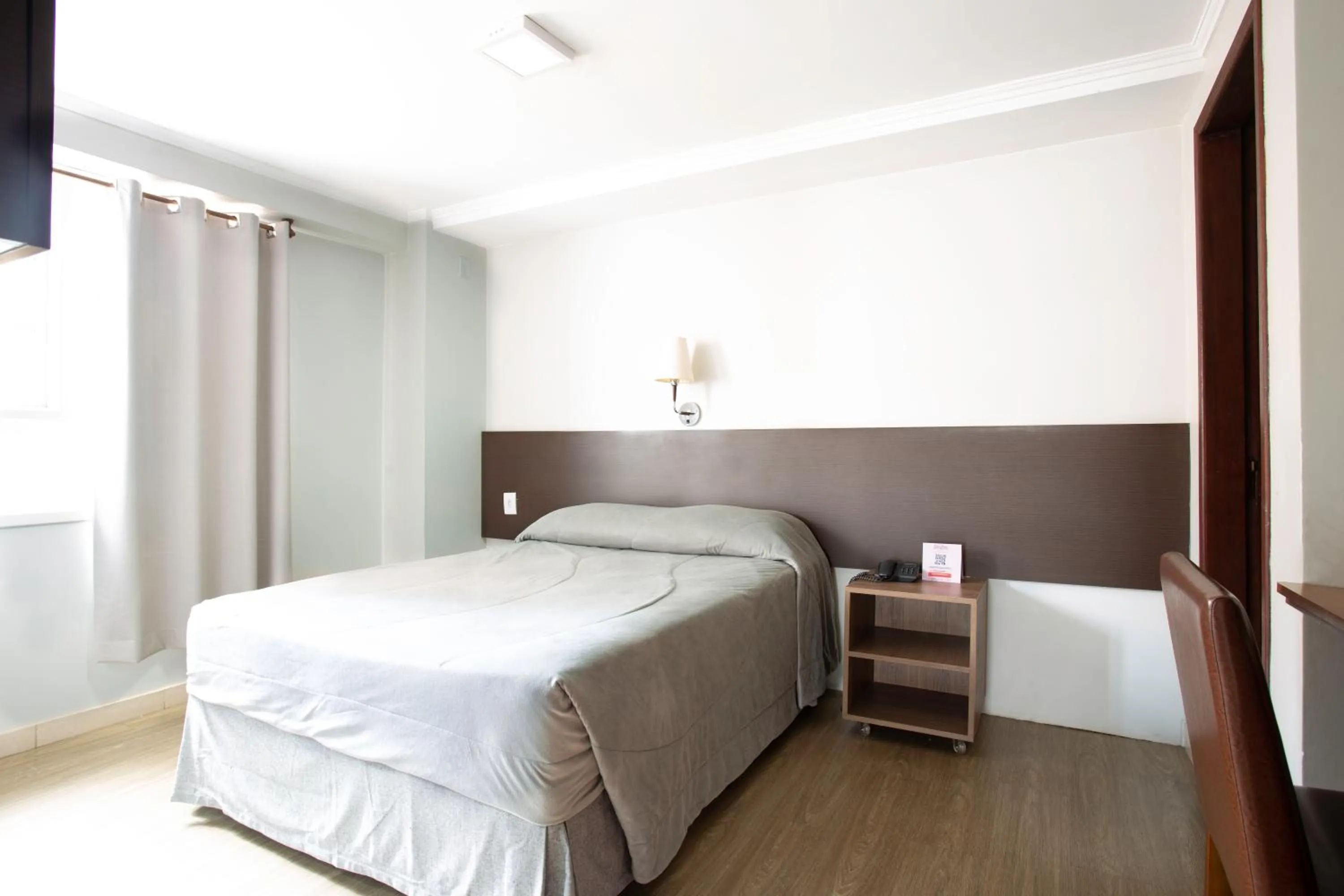 Bed in Hotel Dom Rafael Executivo