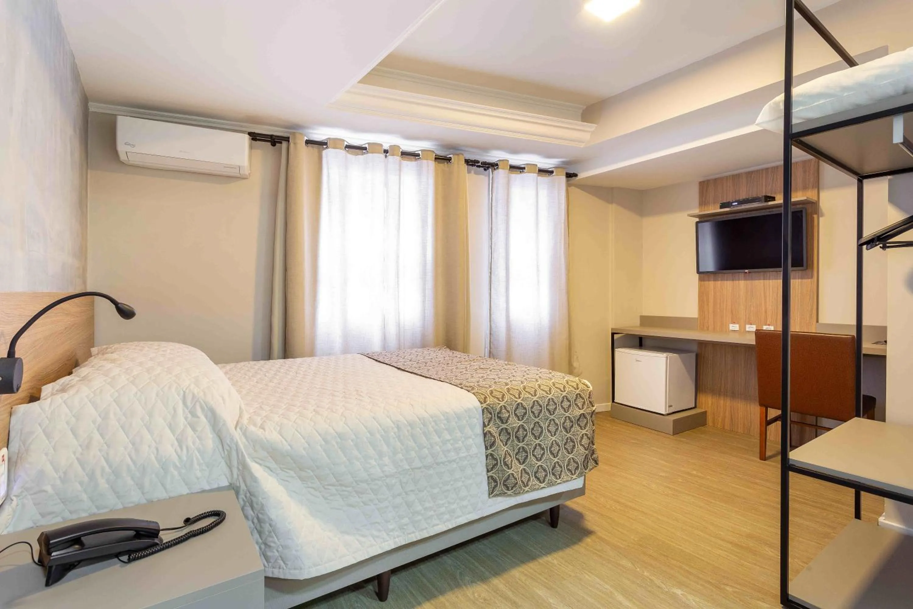 Bed in Hotel Dom Rafael Executivo