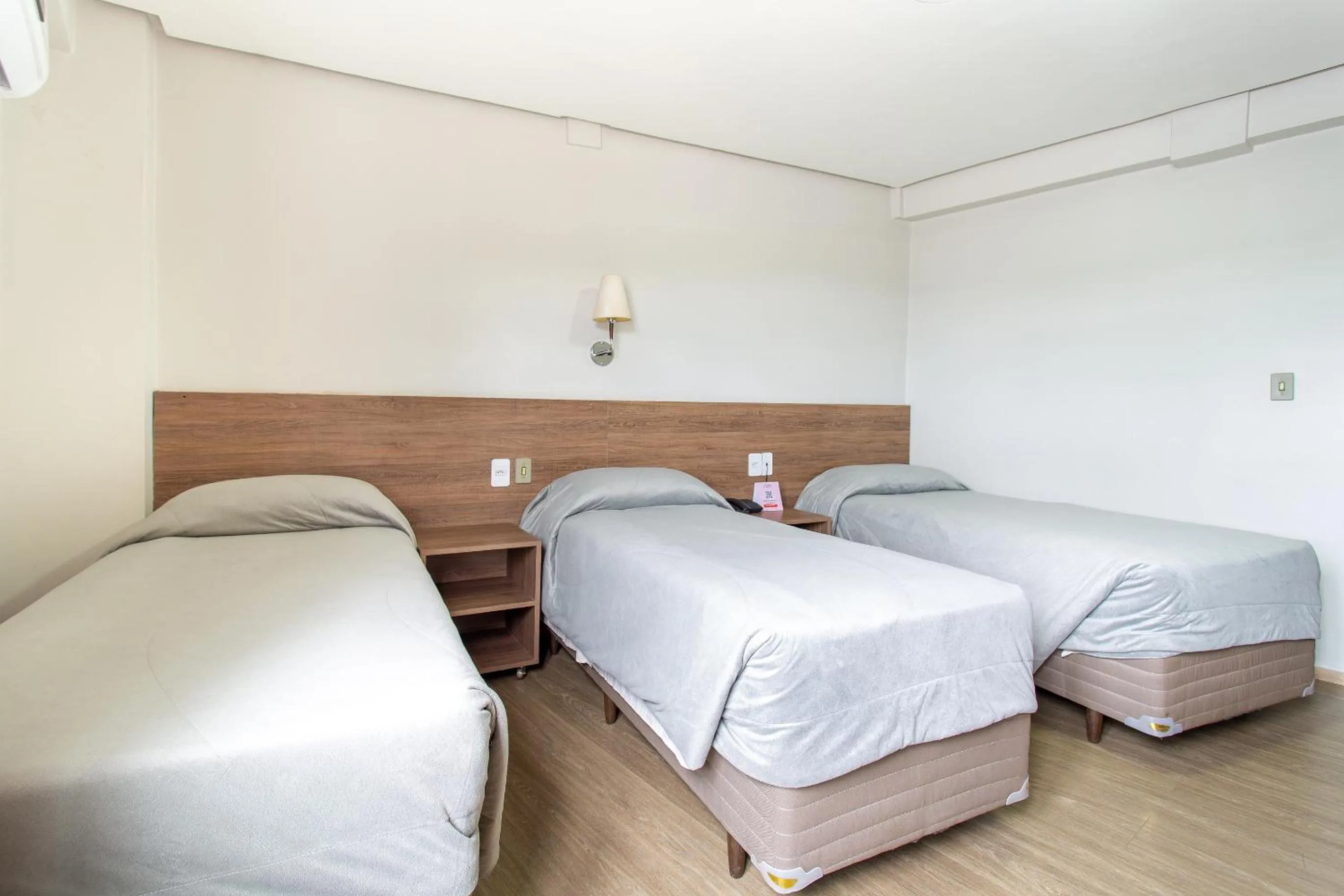 Bed in Hotel Dom Rafael Executivo