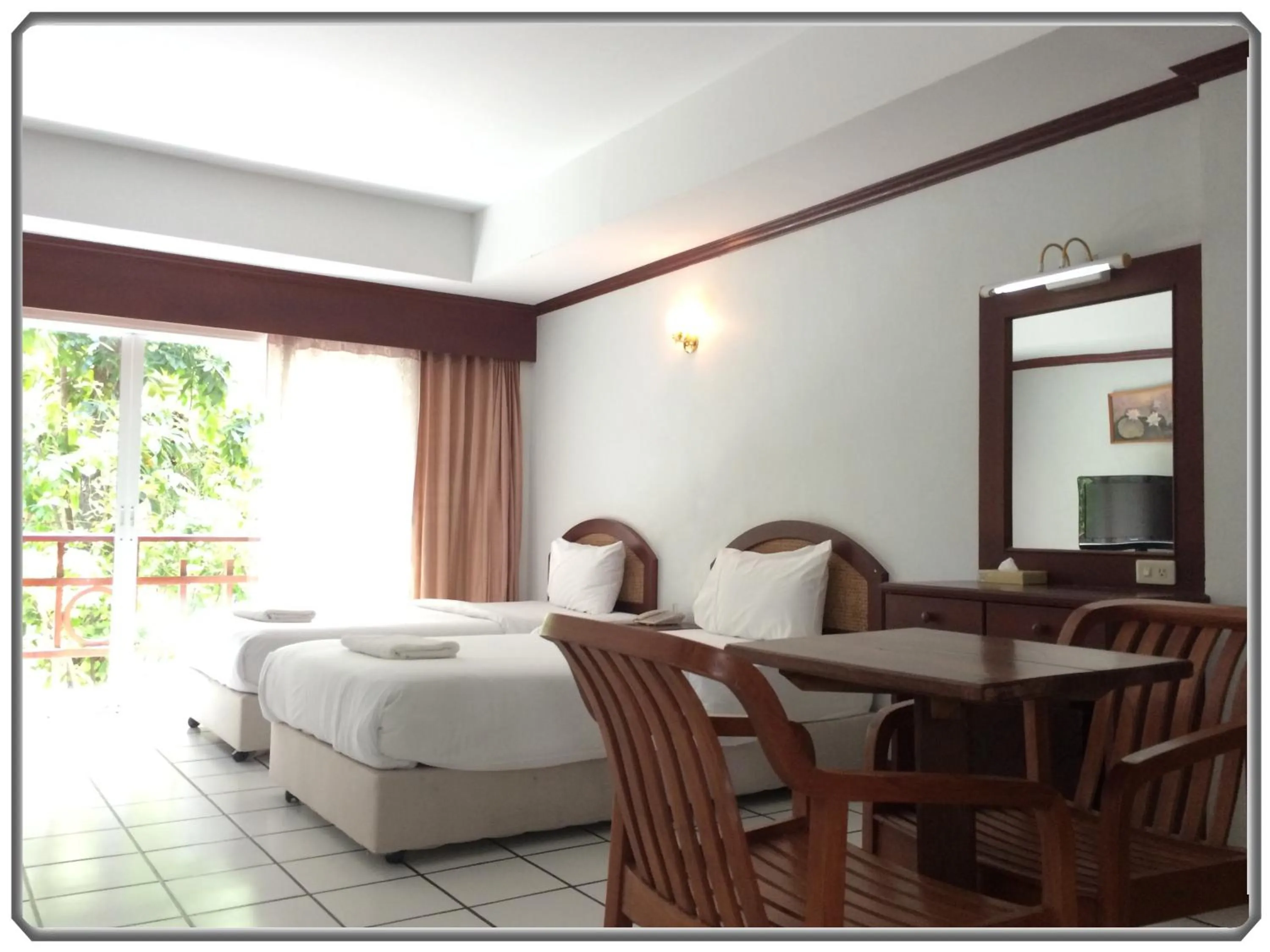 Bed in Thong Paeka Hotel