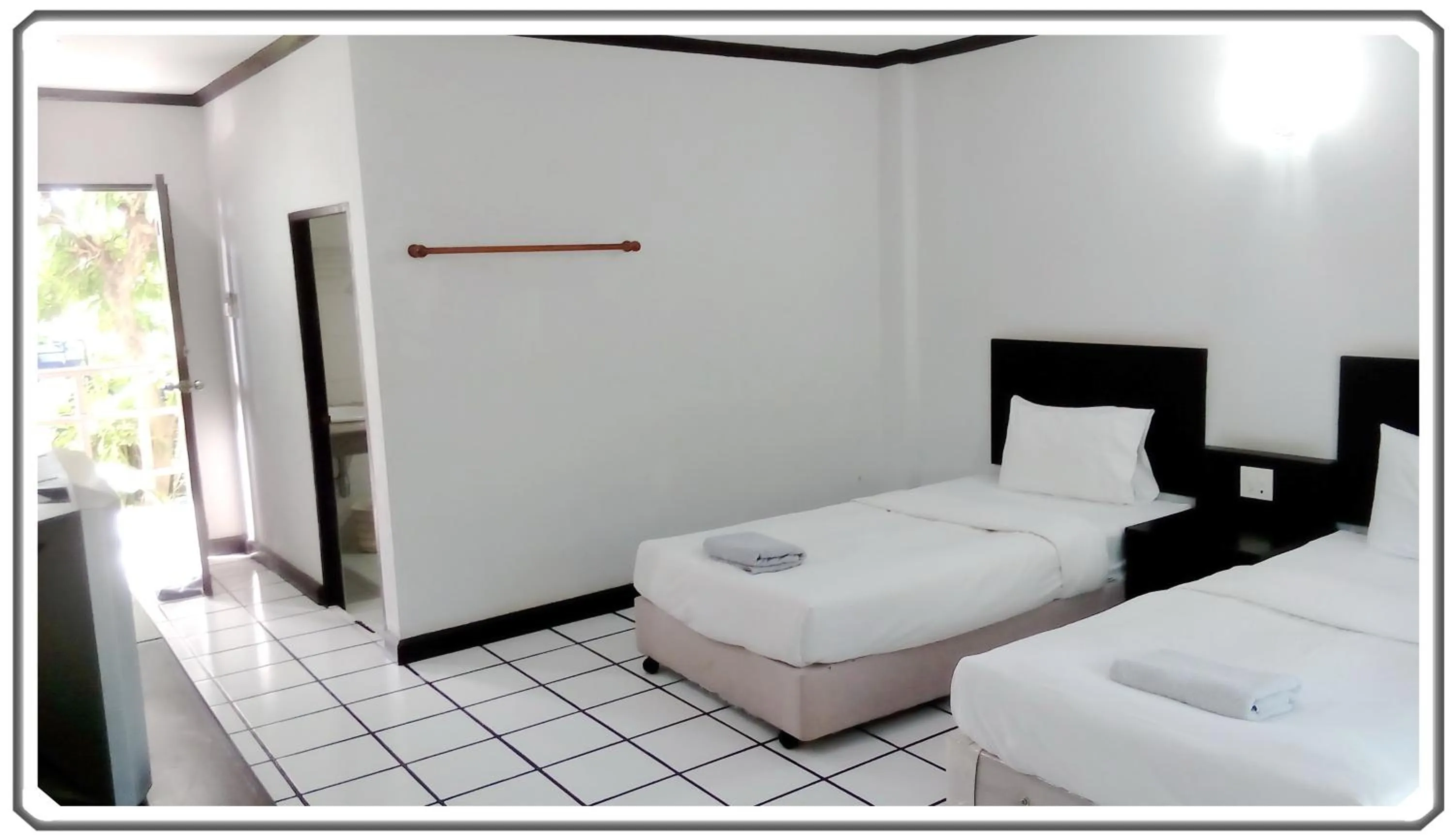 Bed in Thong Paeka Hotel